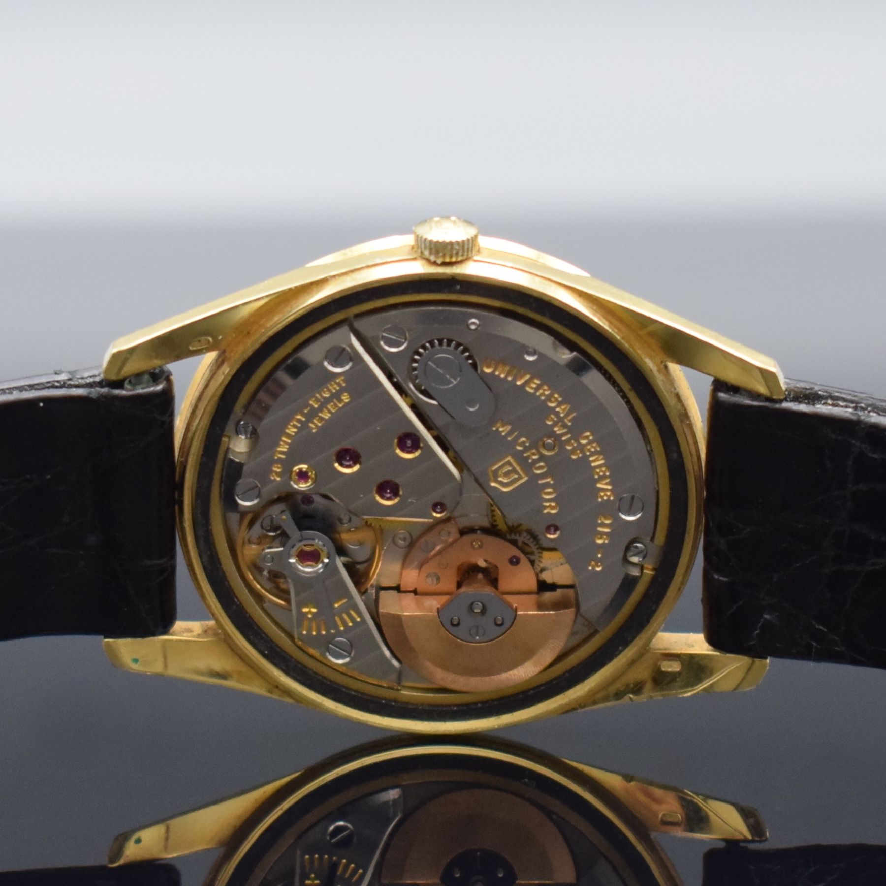 Detail f: UNIVERSAL GENEVE Polrouter Date Herrenarmbanduhr in GG 750/000 mit Kal. 215-2, Schweiz um 1965, Automatik, verschr. Geh. Ref. 104602/1, gold. ...