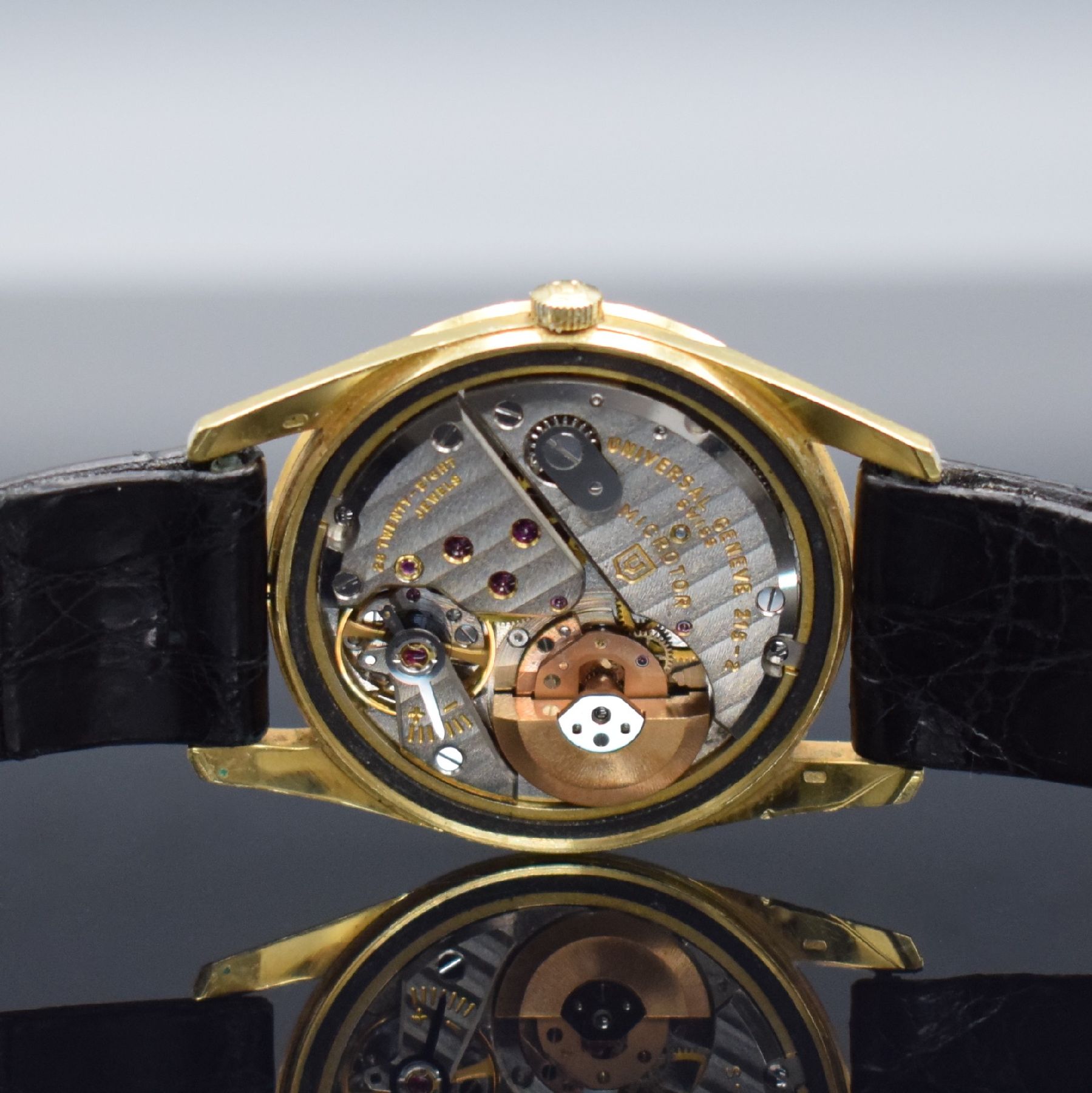 Detail g: UNIVERSAL GENEVE Polrouter Date Herrenarmbanduhr in GG 750/000 mit Kal. 215-2, Schweiz um 1965, Automatik, verschr. Geh. Ref. 104602/1, gold. ...