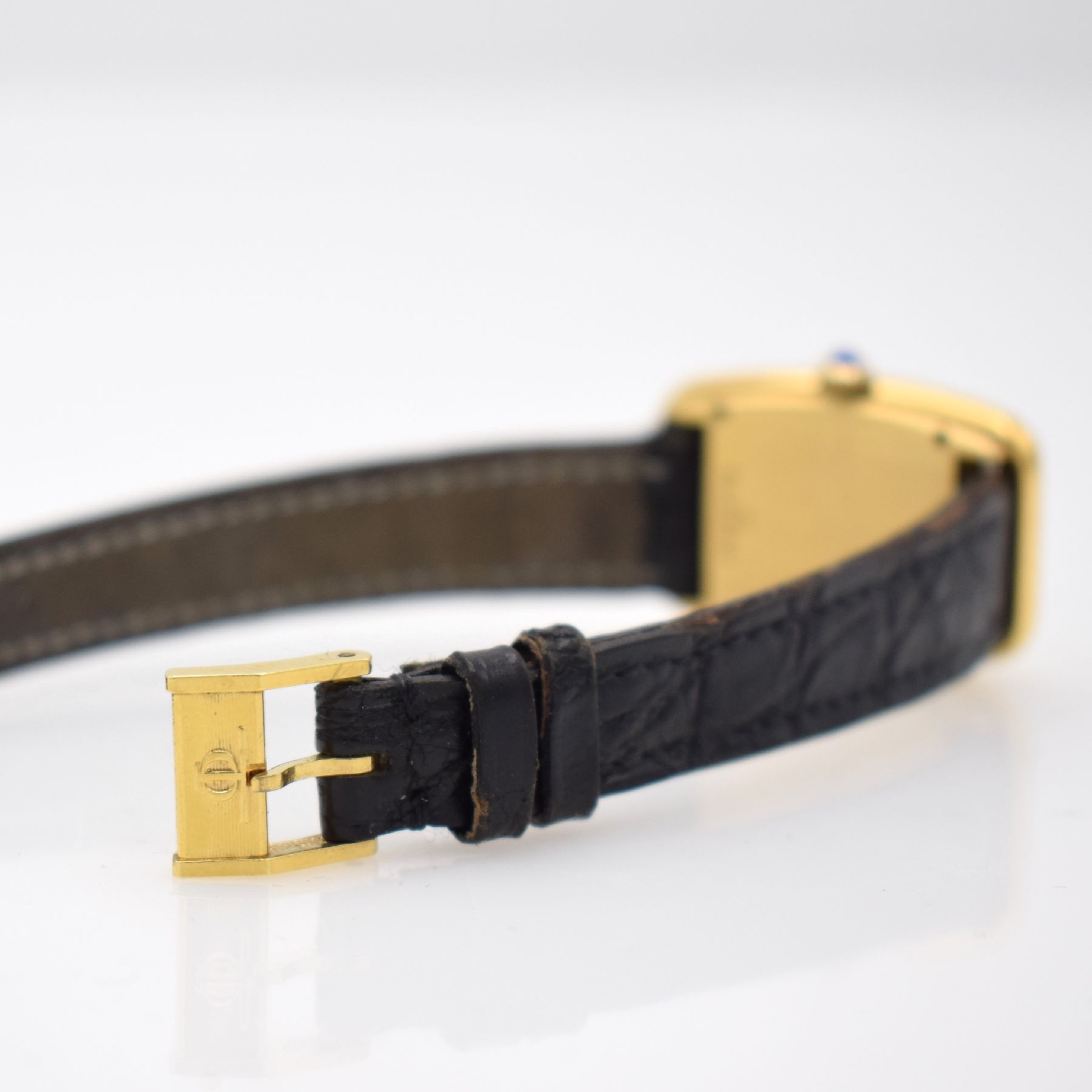Detail e: BAUME & MERCIER Damenarmbanduhr in GG 750/000 Referenz 38298, Handaufzug, Schweiz um 1975, massives, 2-teil. Geh., Glasrand gegen Boden 4-fach ...