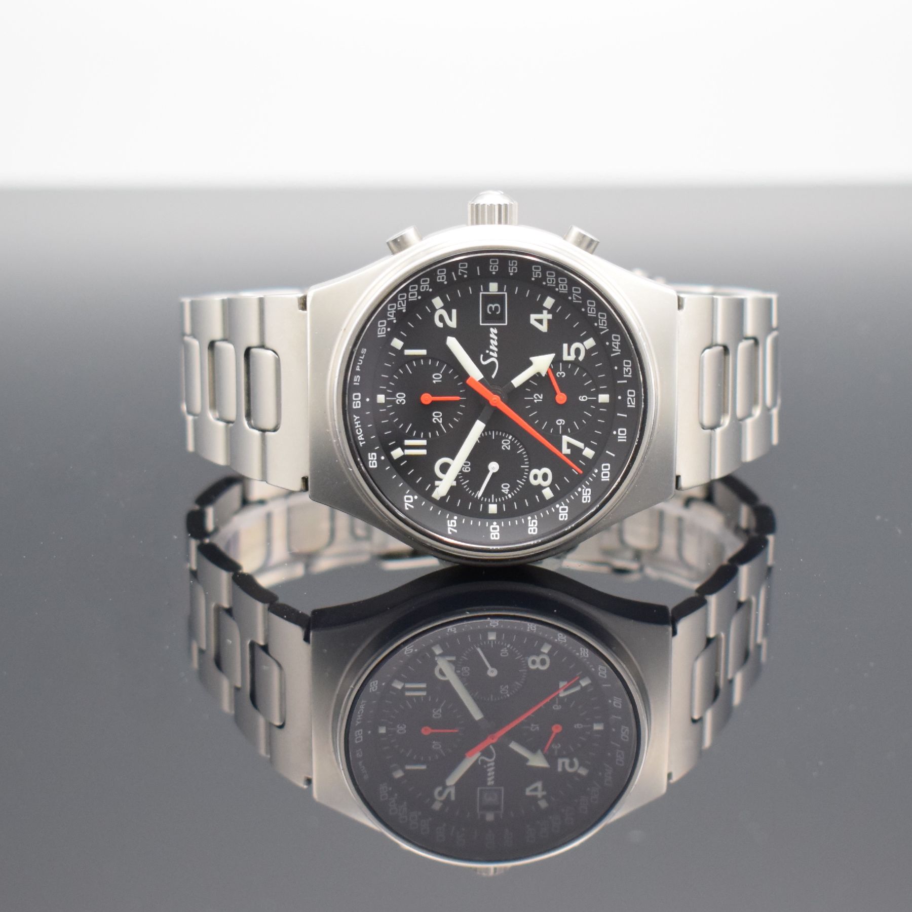 Detail a: SINN Armbandchronograph mit 2. Zeitzone Modell 144 GMT, Schweiz/Deutschland um 1995, Automatik, matt. Edelstahlgeh. inkl. Gliederband m. Faltschl., ...