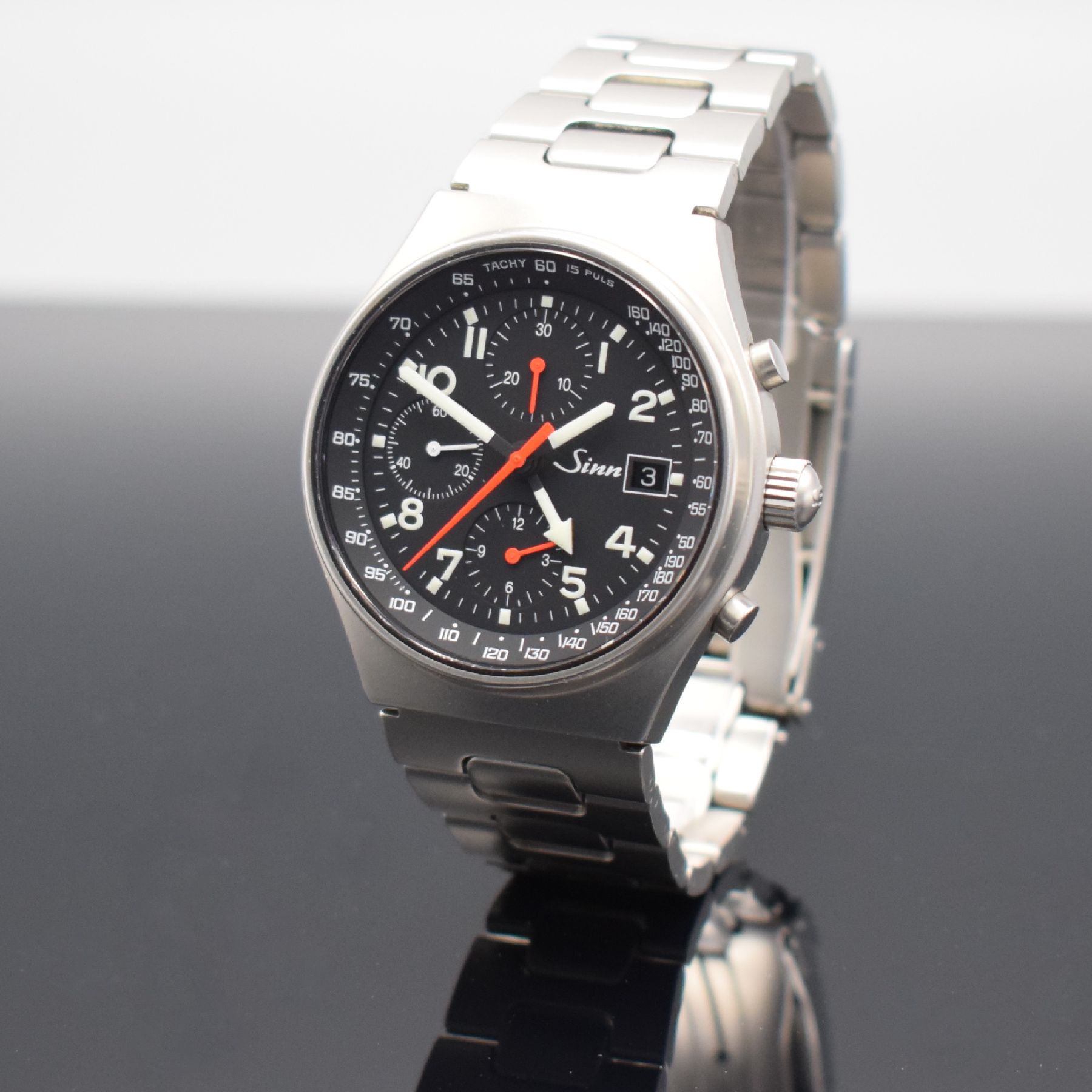 Detail c: SINN Armbandchronograph mit 2. Zeitzone Modell 144 GMT, Schweiz/Deutschland um 1995, Automatik, matt. Edelstahlgeh. inkl. Gliederband m. Faltschl., ...