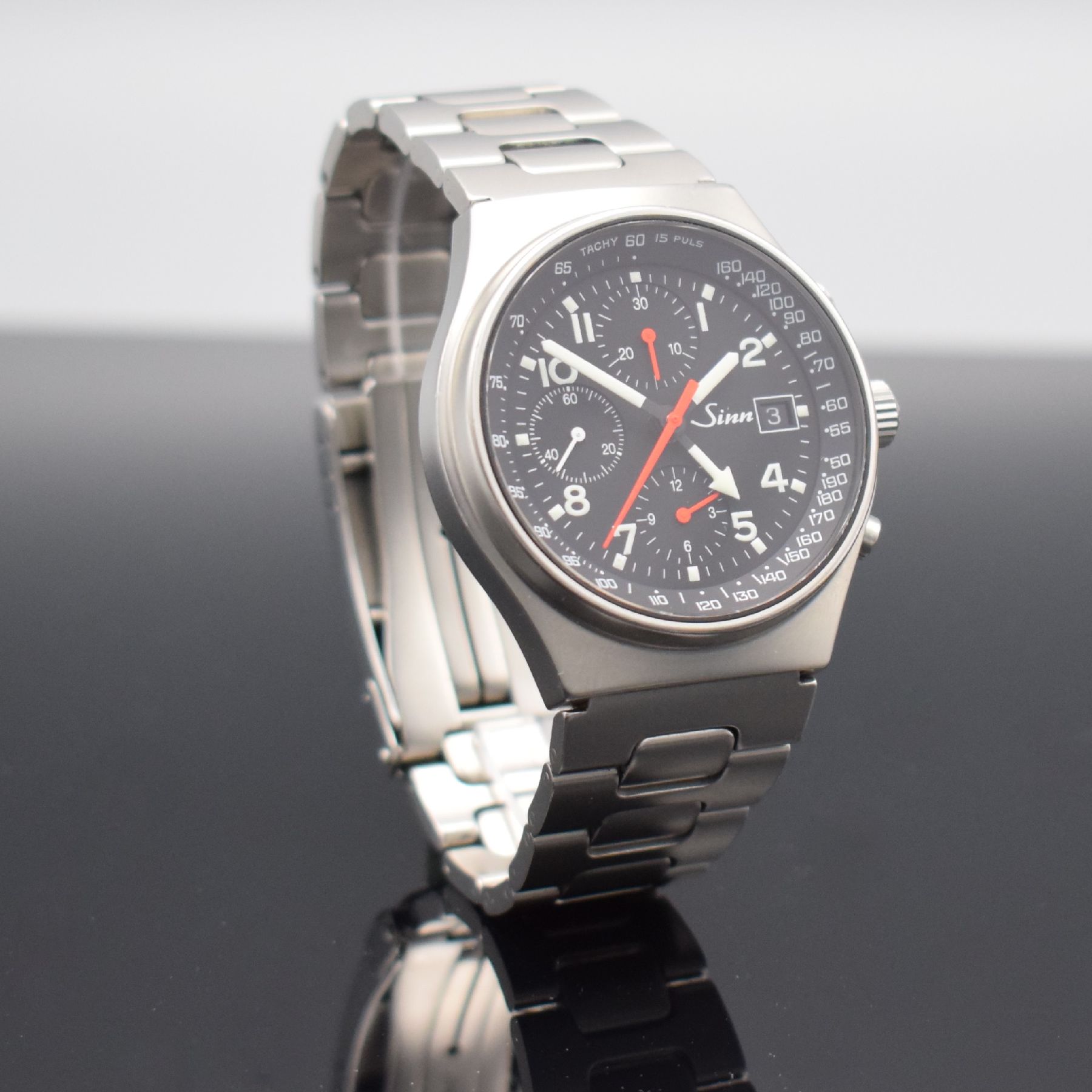 Detail e: SINN Armbandchronograph mit 2. Zeitzone Modell 144 GMT, Schweiz/Deutschland um 1995, Automatik, matt. Edelstahlgeh. inkl. Gliederband m. Faltschl., ...