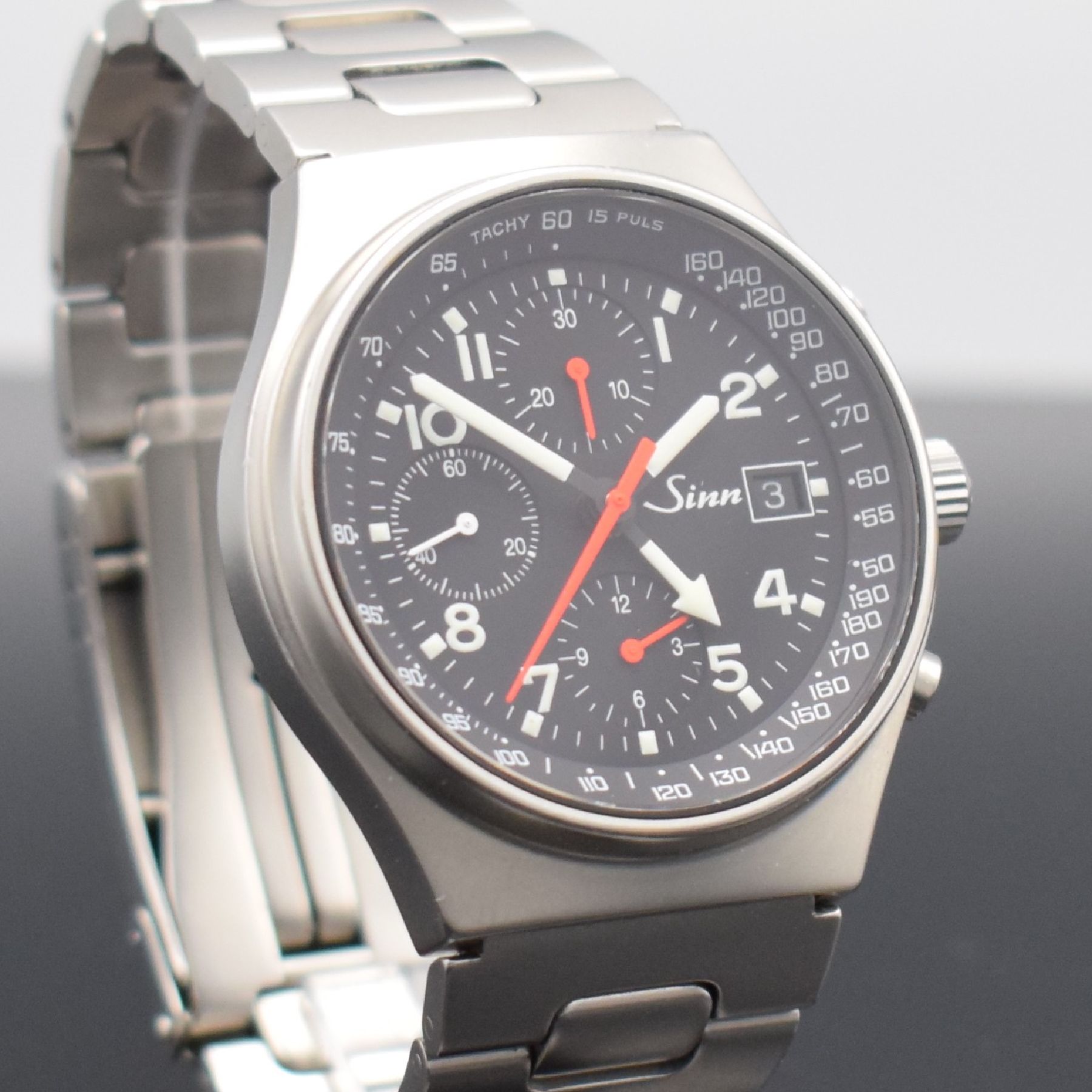 Detail f: SINN Armbandchronograph mit 2. Zeitzone Modell 144 GMT, Schweiz/Deutschland um 1995, Automatik, matt. Edelstahlgeh. inkl. Gliederband m. Faltschl., ...