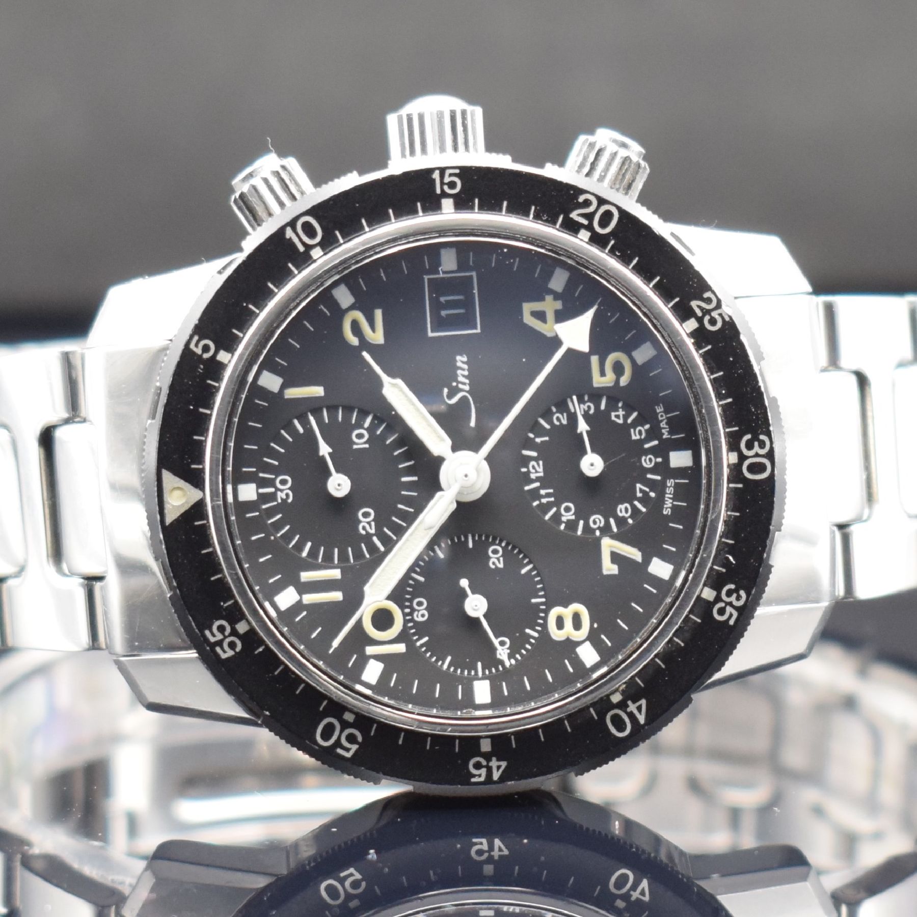 Detail a: SINN 103 Herrenarmbanduhr mit Chronograph, Schweiz/Deutschland um 1990, beids. vergl. & verschr. Edelstahlgeh., orig. Gliederband m. Faltschl., ...