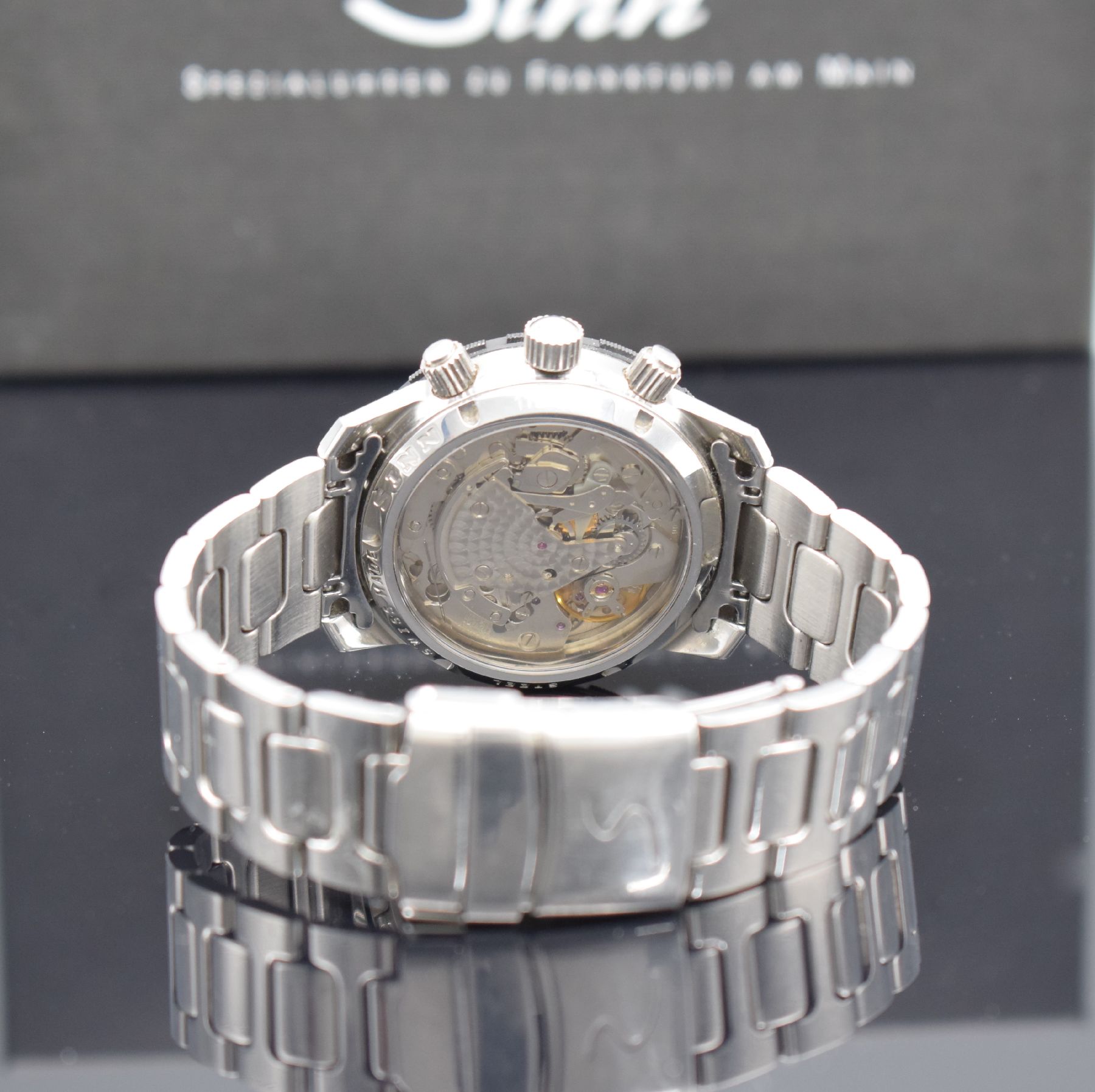 Detail f: SINN 103 Herrenarmbanduhr mit Chronograph, Schweiz/Deutschland um 1990, beids. vergl. & verschr. Edelstahlgeh., orig. Gliederband m. Faltschl., ...