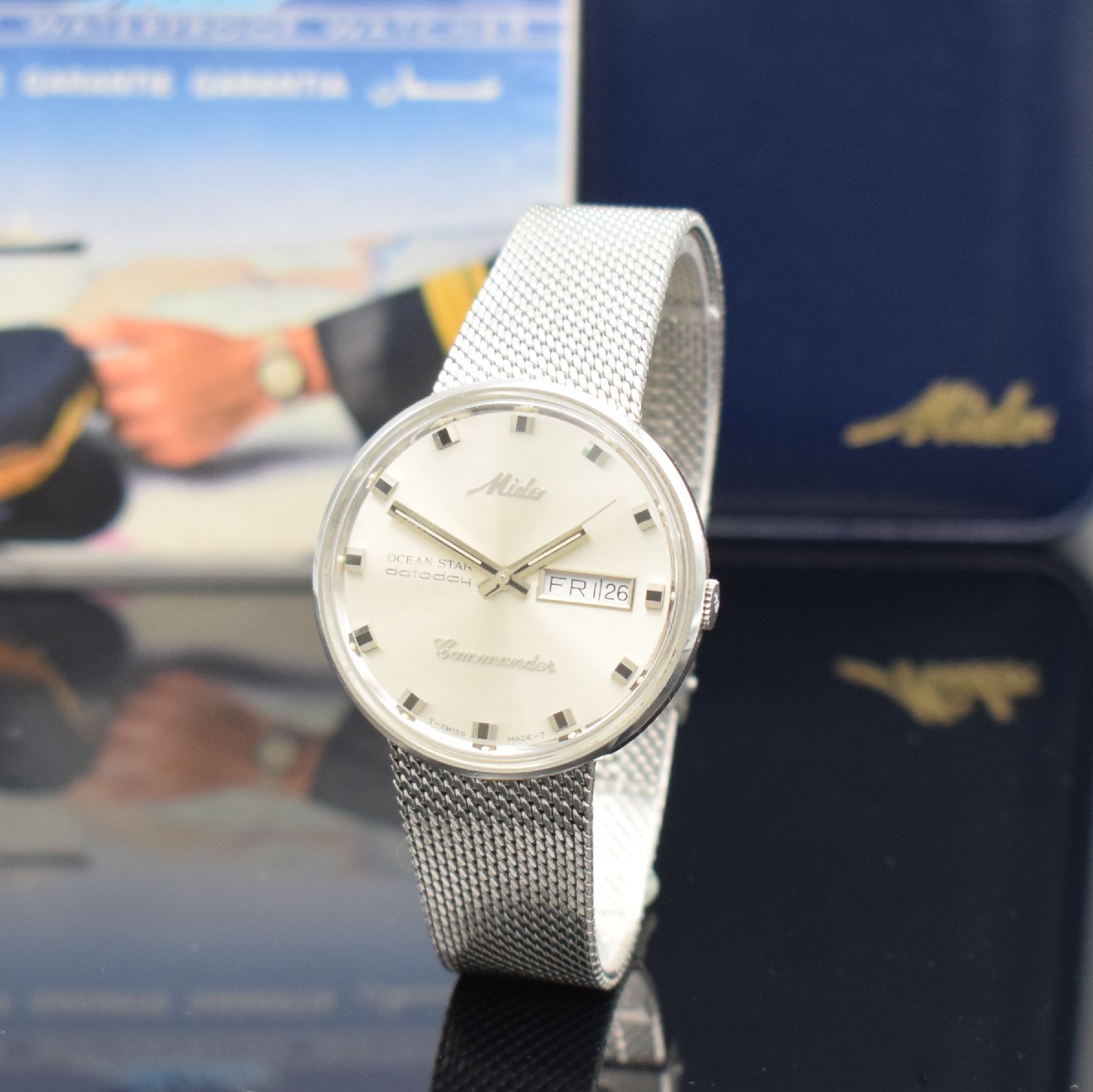 Detail b: MIDO Commander Herrenarmbanduhr am Milanaiseband in Edelstahl, Schweiz um 1992, Automatik, Ref. 636-8429, Monocoque-Geh., silb. Zifferbl. m. aufges. ...
