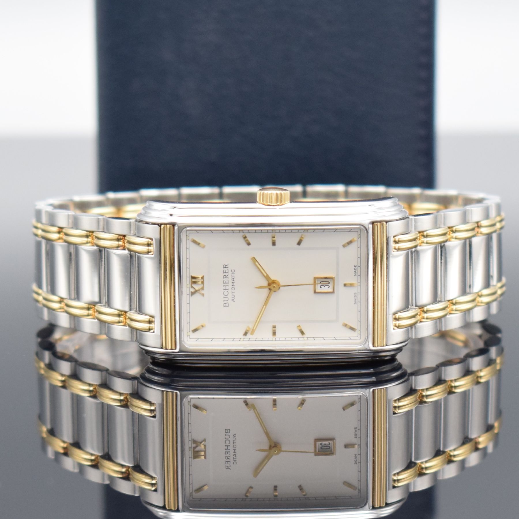BUCHERER rechteckige Herrenarmbanduhr Modell Archimedes in Stahl/Gold, Schweiz verk. lt. beil. Pap. 03/1996, Automatik, Ref. 2000-503, Boden 4-fach ...