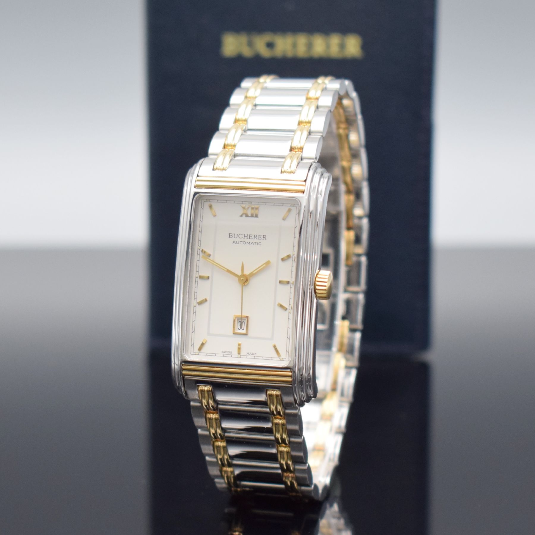 Detail b: BUCHERER rechteckige Herrenarmbanduhr Modell Archimedes in Stahl/Gold, Schweiz verk. lt. beil. Pap. 03/1996, Automatik, Ref. 2000-503, Boden 4-fach ...