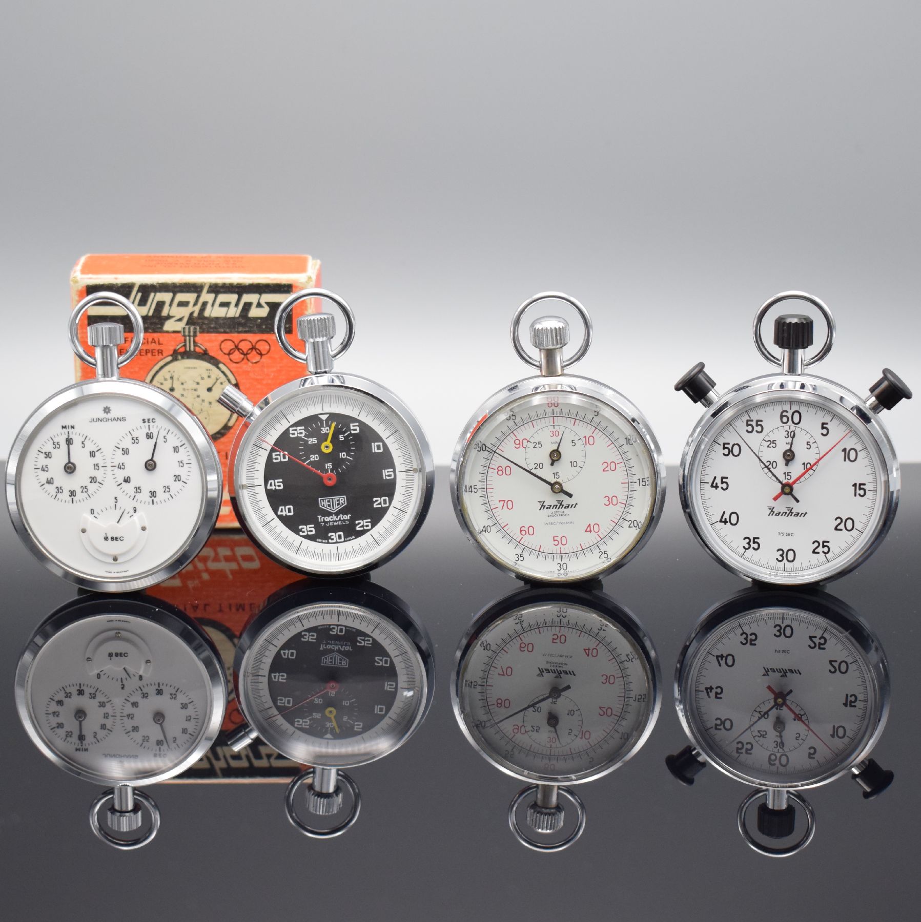 Konvolut: 4 Stoppuhren, 2x Hanhart, Heuer & Junghans, Schweiz/Deutschland um 1965-1975, Handaufzug, verchr. Geh., 1)Hanhart m. Rattrapante-Funktion, ...