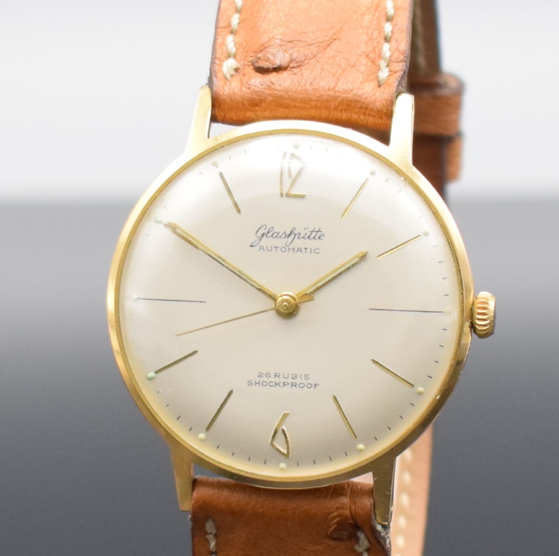 Detail c: GLASHÜTTE Herrenarmbanduhr, Automatik, Deutschland um 1970, verg. Metallgeh., Edelstahlboden aufgedr., silb. Zifferbl. m. aufgel. gold. Indizes, ...