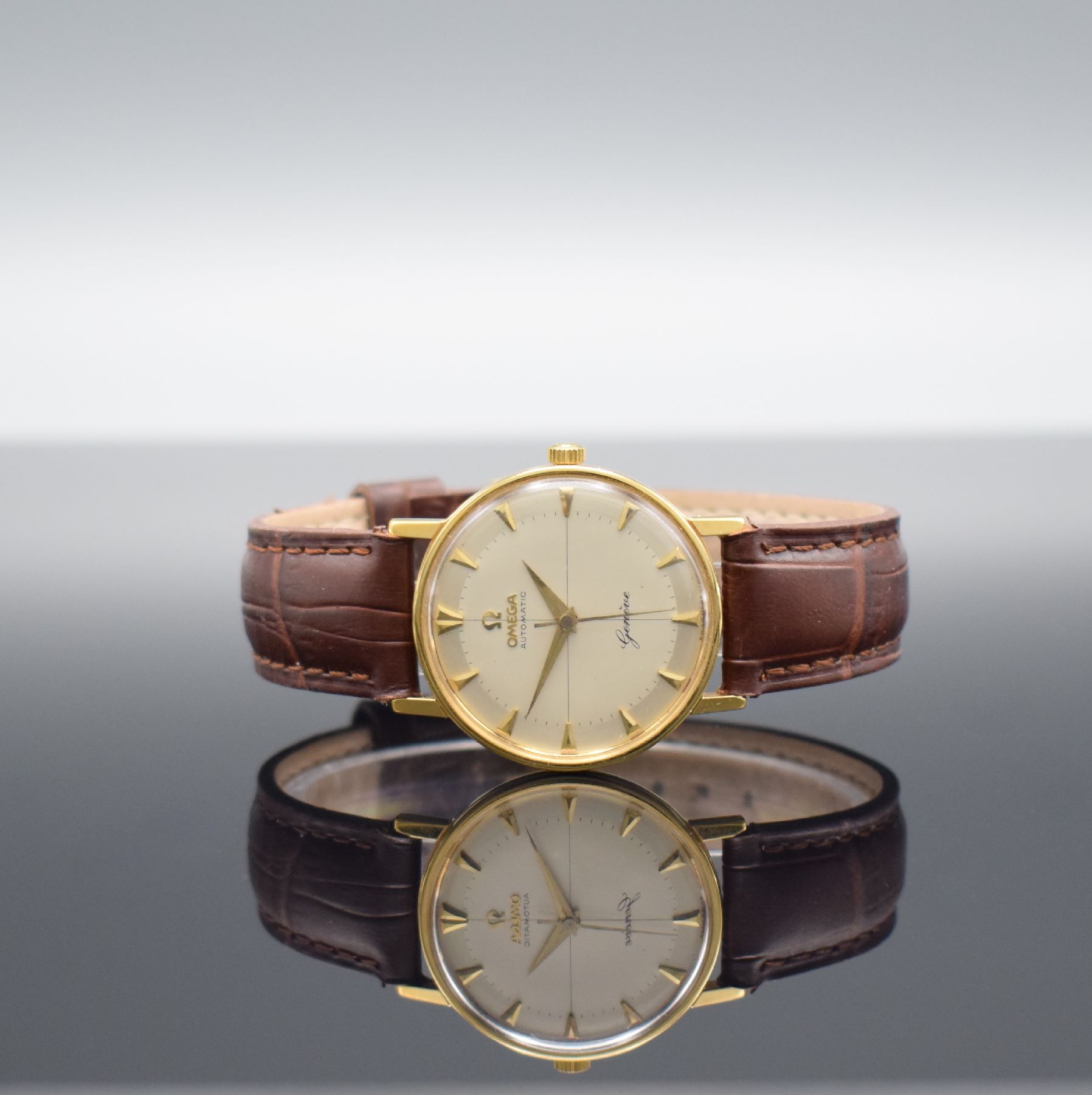 OMEGA Herrenarmbanduhr Serie Geneve, Automatik, Schweiz um 1964, verg. Metallgeh., Edelstahlboden aufgedr., Lederband m. verg. orig. Dornschl., orig. ...