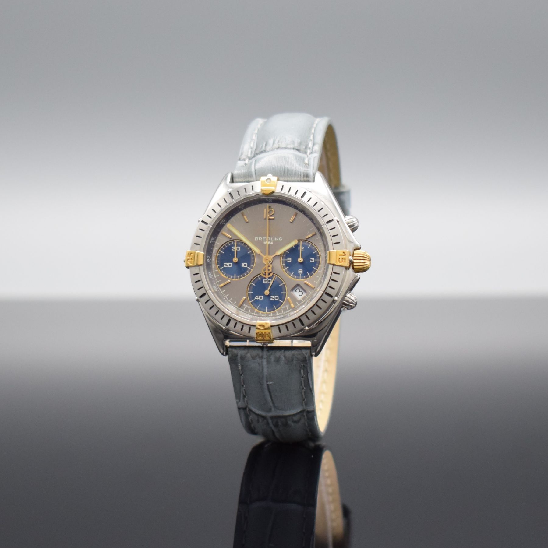 Detail b: BREITLING Sextant Armbandchronograph, Schweiz um 1995, quarz, Ref. B55045, Edelstahl/Gold komb., Boden & Krone verschr., Lün. m. 60er Teilung ...