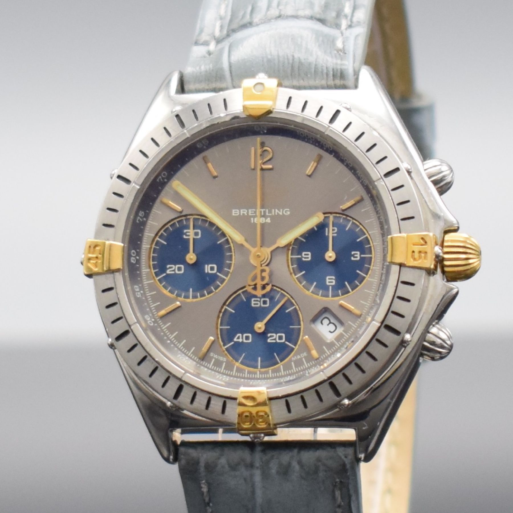 Detail c: BREITLING Sextant Armbandchronograph, Schweiz um 1995, quarz, Ref. B55045, Edelstahl/Gold komb., Boden & Krone verschr., Lün. m. 60er Teilung ...