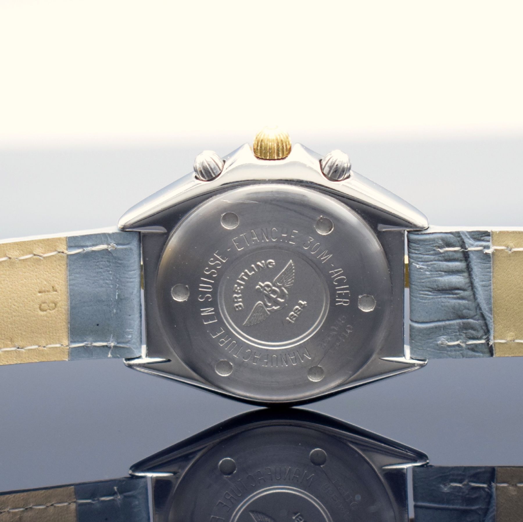 Detail d: BREITLING Sextant Armbandchronograph, Schweiz um 1995, quarz, Ref. B55045, Edelstahl/Gold komb., Boden & Krone verschr., Lün. m. 60er Teilung ...