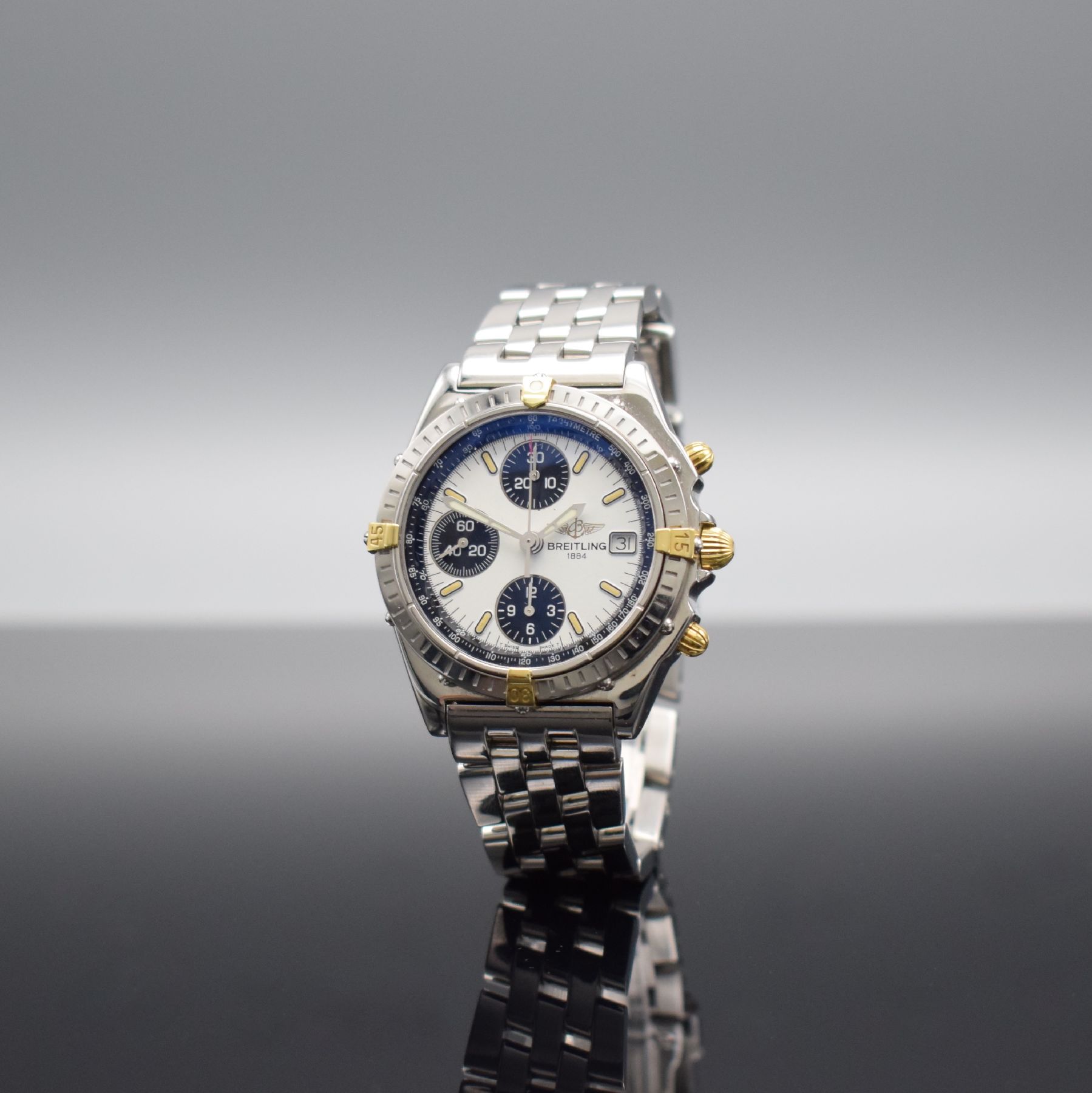 Detail b: BREITLING Chronomat Herrenarmbanduhr, Automatik, Schweiz um 1995, Ref. 81.950, Edelstahl/Gold komb. inkl. Pilotband m. Faltschl., Boden & Krone ...