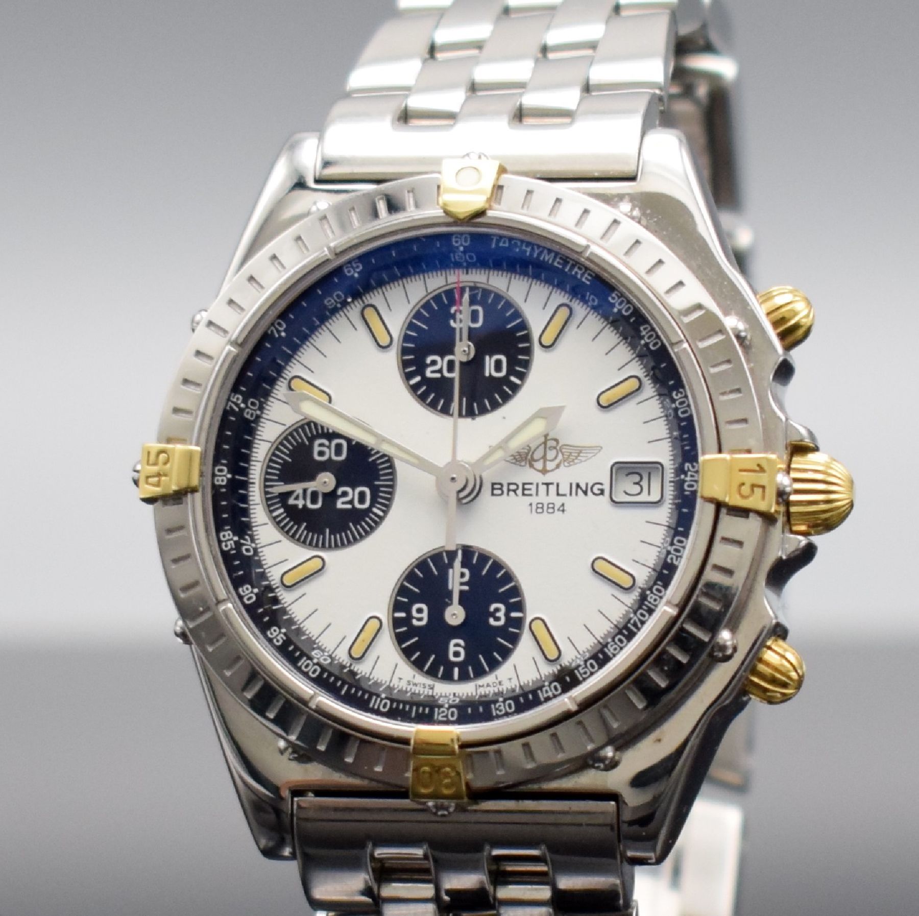Detail c: BREITLING Chronomat Herrenarmbanduhr, Automatik, Schweiz um 1995, Ref. 81.950, Edelstahl/Gold komb. inkl. Pilotband m. Faltschl., Boden & Krone ...