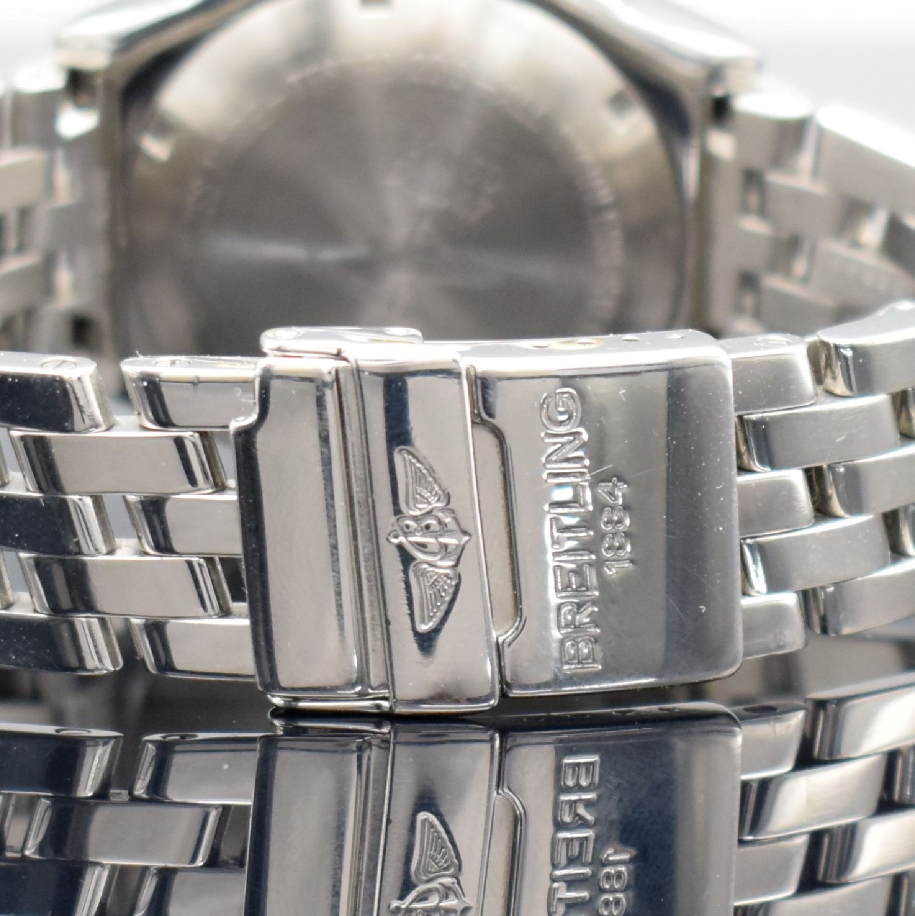 Detail d: BREITLING Chronomat Herrenarmbanduhr, Automatik, Schweiz um 1995, Ref. 81.950, Edelstahl/Gold komb. inkl. Pilotband m. Faltschl., Boden & Krone ...