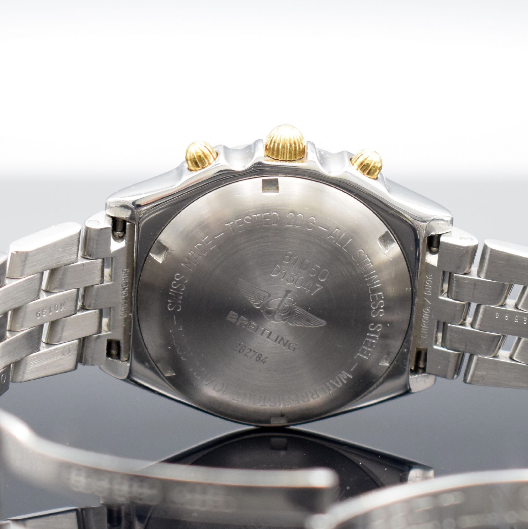 Detail e: BREITLING Chronomat Herrenarmbanduhr, Automatik, Schweiz um 1995, Ref. 81.950, Edelstahl/Gold komb. inkl. Pilotband m. Faltschl., Boden & Krone ...