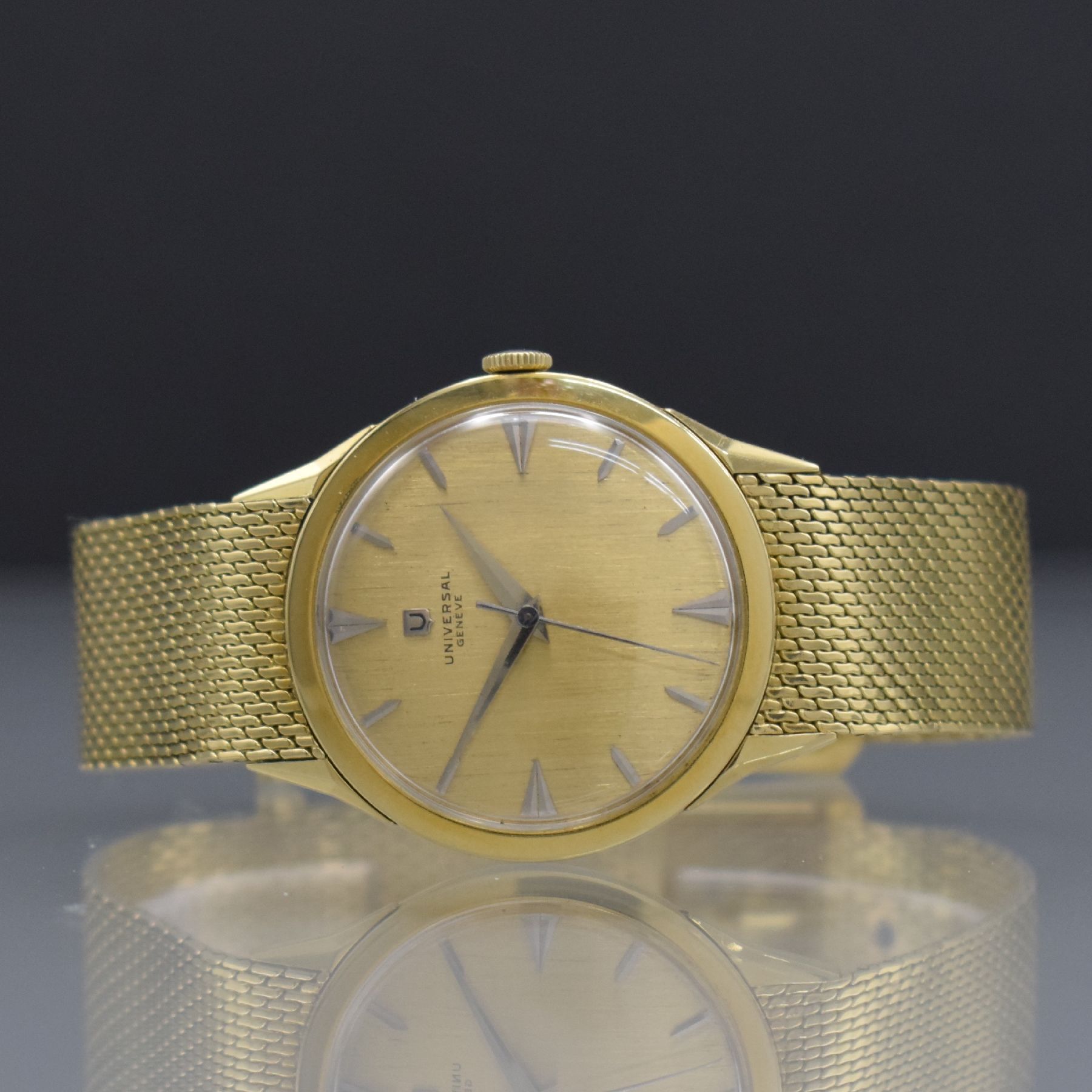 UNIVERSAL GENEVE Herrenarmbanduhr in GG 750/000 Referenz 106548-1, Handaufzug, Schweiz um 1960, 3-teil. Geh., Boden & Glasrand aufgedr., spezielles ...