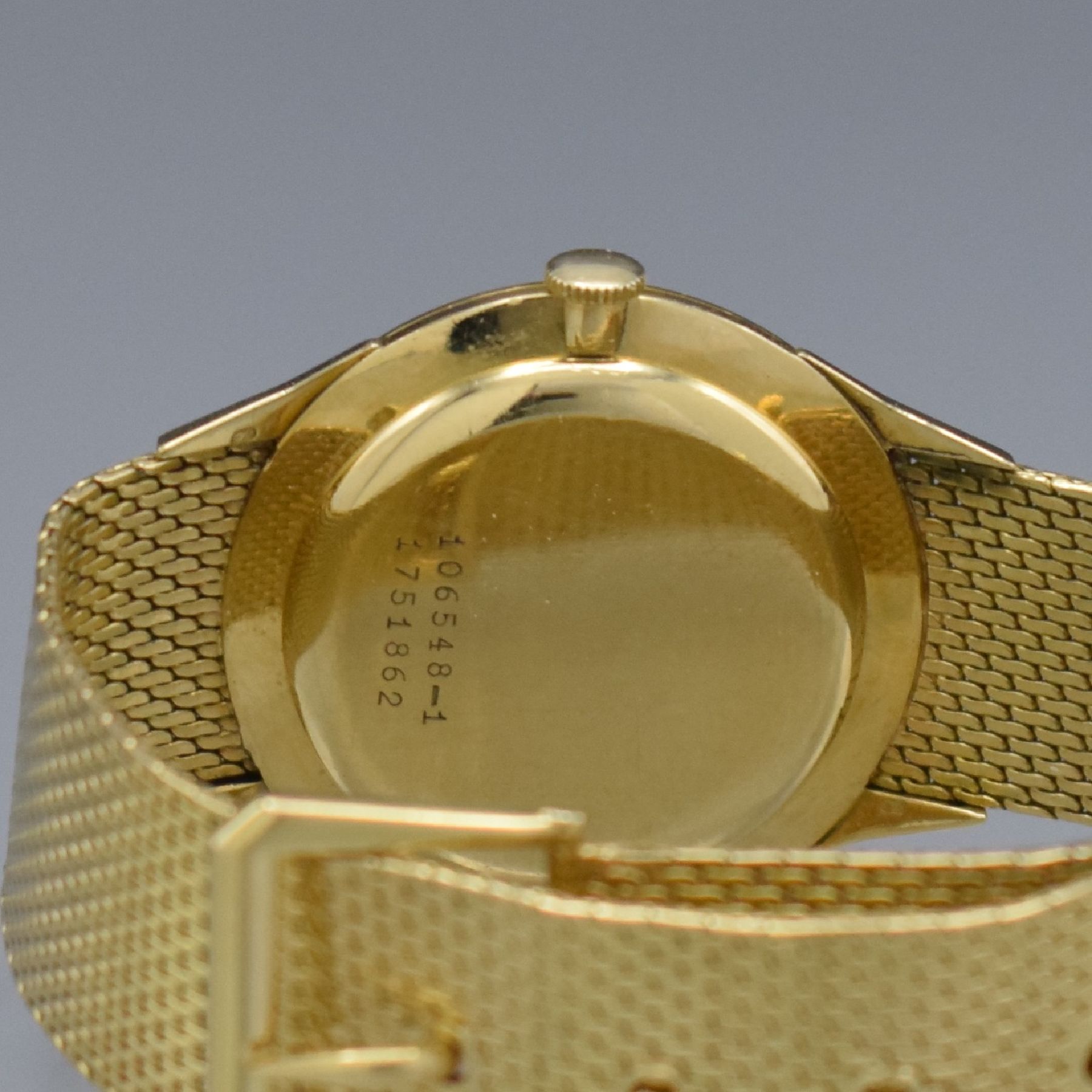 Detail g: UNIVERSAL GENEVE Herrenarmbanduhr in GG 750/000 Referenz 106548-1, Handaufzug, Schweiz um 1960, 3-teil. Geh., Boden & Glasrand aufgedr., spezielles ...