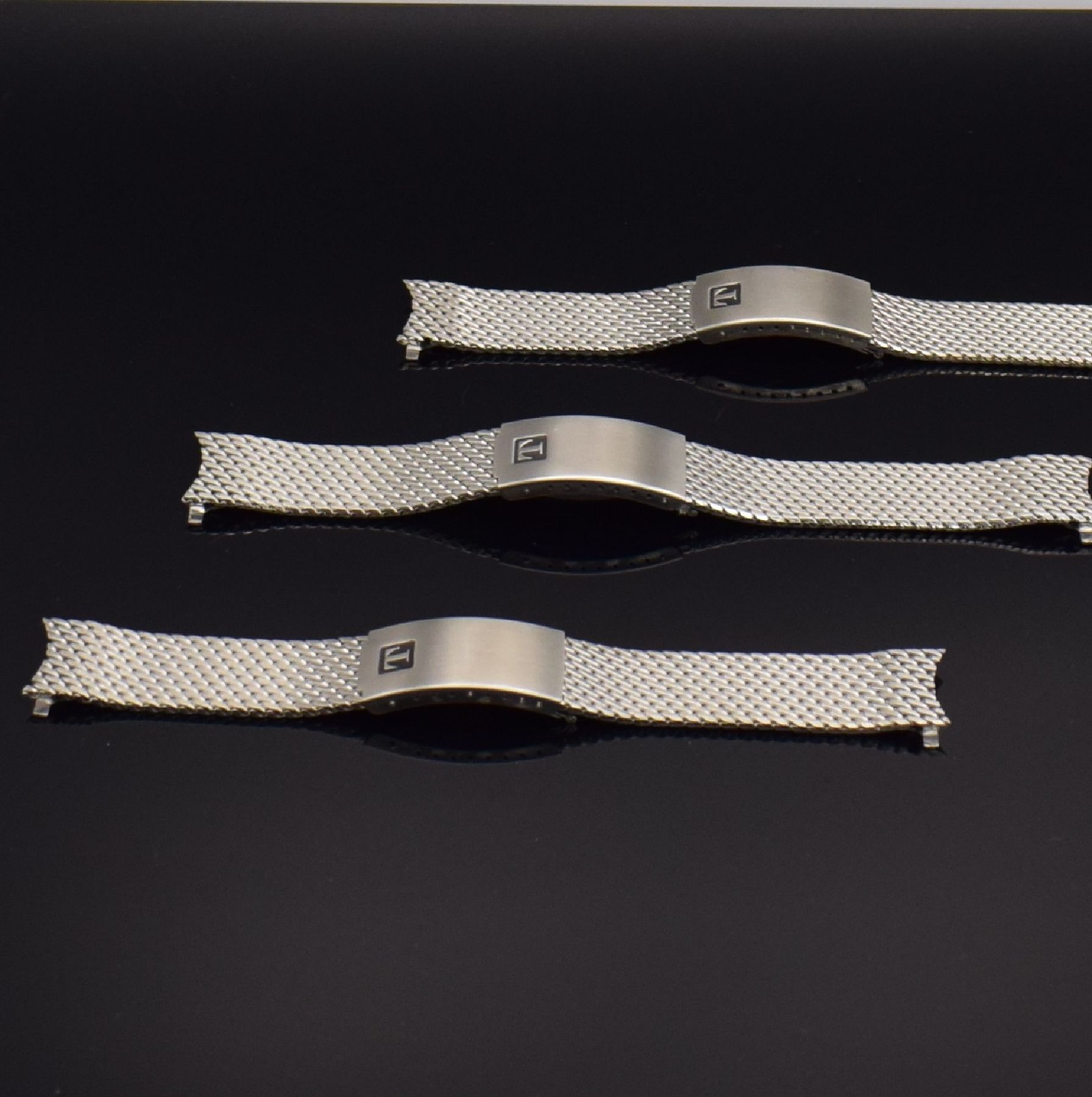 Detail a: 7 interessante & unbenutzte Armbanduhrbänder in Edelstahl, Schweiz/Deutschland um 1970, 3x Tissot Milanaise-Bänder ca. 18 mm Breite, 3x Dugena ...