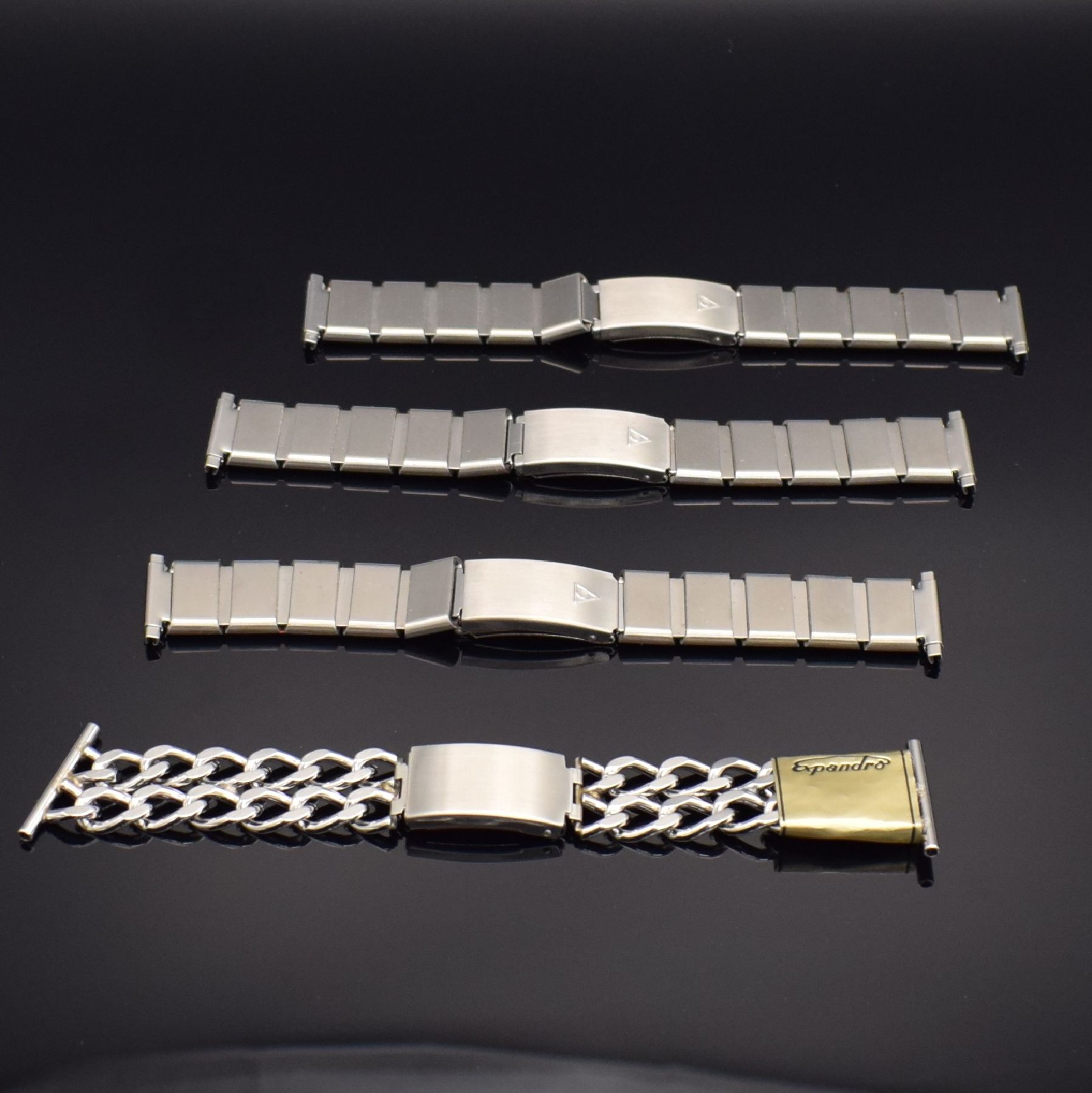 Detail c: 7 interessante & unbenutzte Armbanduhrbänder in Edelstahl, Schweiz/Deutschland um 1970, 3x Tissot Milanaise-Bänder ca. 18 mm Breite, 3x Dugena ...