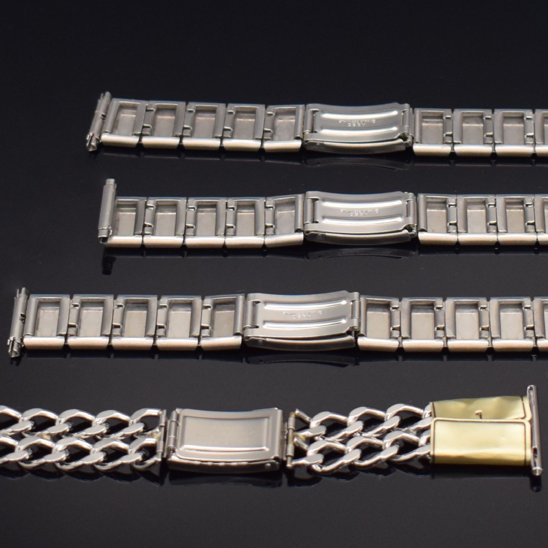 Detail d: 7 interessante & unbenutzte Armbanduhrbänder in Edelstahl, Schweiz/Deutschland um 1970, 3x Tissot Milanaise-Bänder ca. 18 mm Breite, 3x Dugena ...