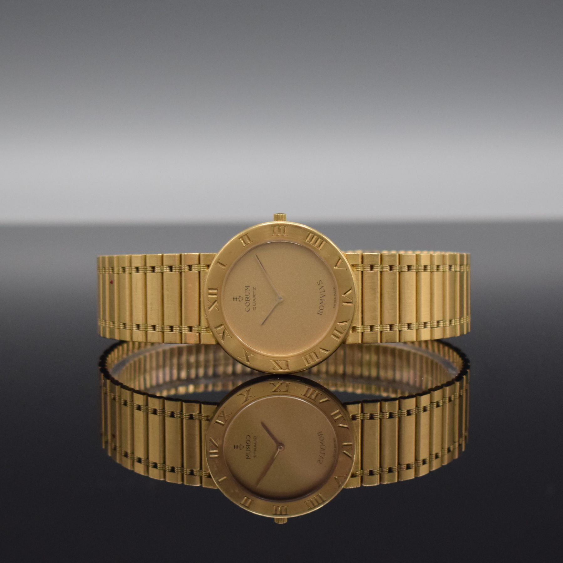 CORUM Herrenarmbanduhr ROMULUS in GG 750/000, Schweiz um 1990, quarz, Ref. 50.103.56V48, orig. GG 750/000 Gliederband, Boden 6-fach verschr., gold. ...
