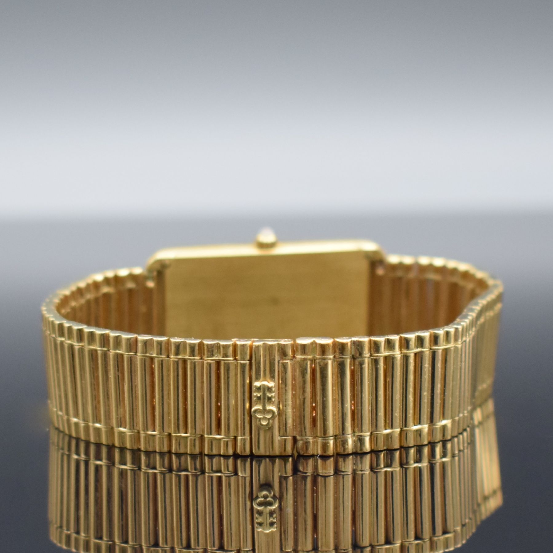 Detail d: CORUM Herrenarmbanduhr in Form eines 15g Feingoldbarrens, Schweiz um 1993, quarz, Ref. 44400, GG 750/000 Gehäuse inkl Gliederband m. dopp. ...