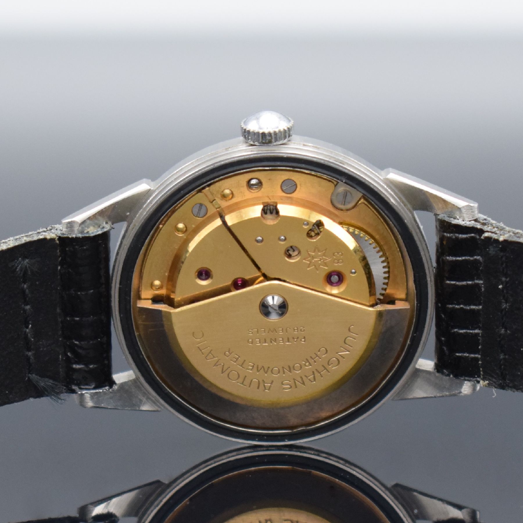 Detail e: JUNGHANS Chronometer Automatic Herrenarmbanduhr in Stahl, Deutschland um 1958, 2-tlg. Geh., Boden aufgedr., silb. Zifferbl. m. aufges. gold. Indizes ...