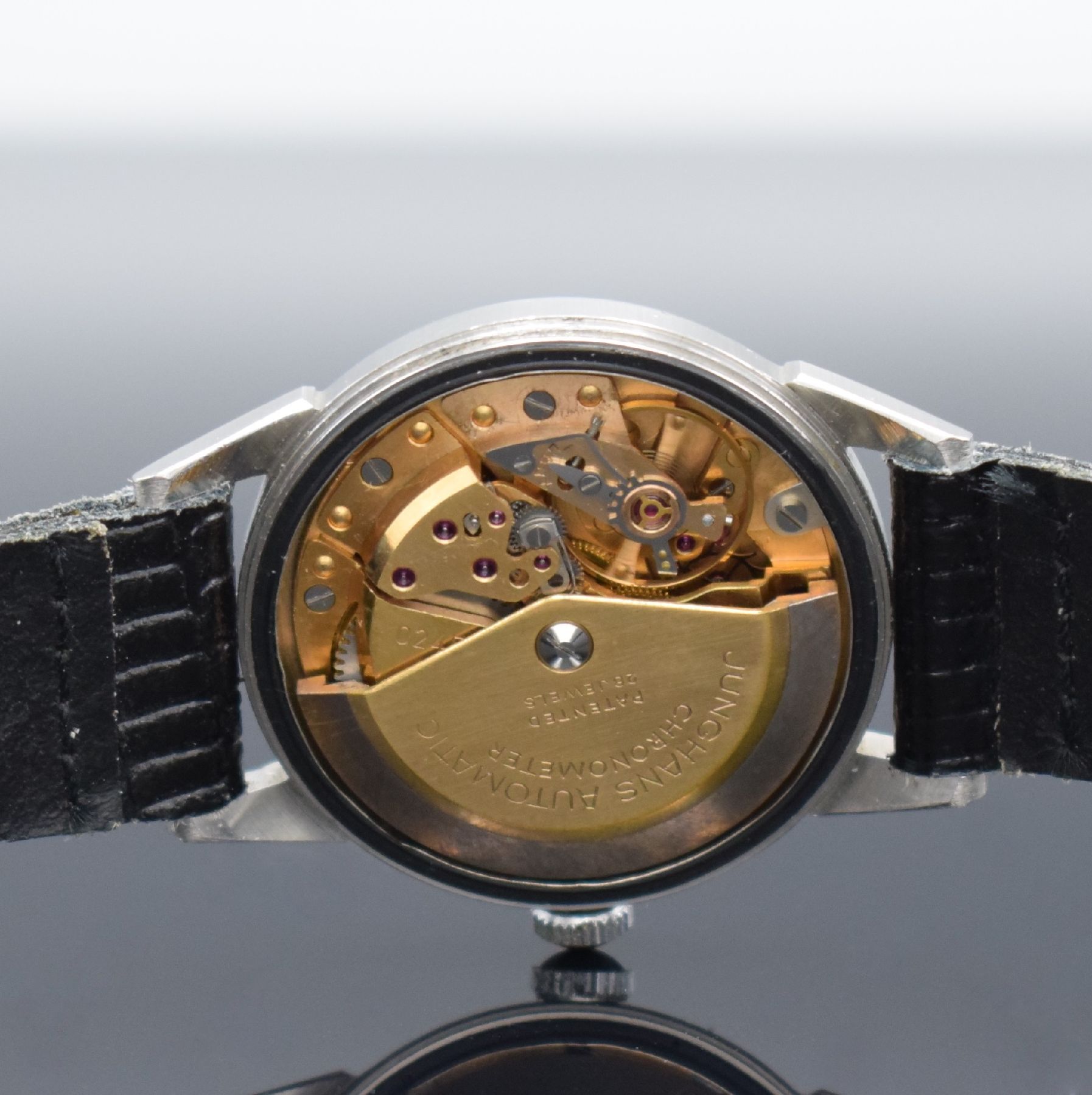 Detail f: JUNGHANS Chronometer Automatic Herrenarmbanduhr in Stahl, Deutschland um 1958, 2-tlg. Geh., Boden aufgedr., silb. Zifferbl. m. aufges. gold. Indizes ...