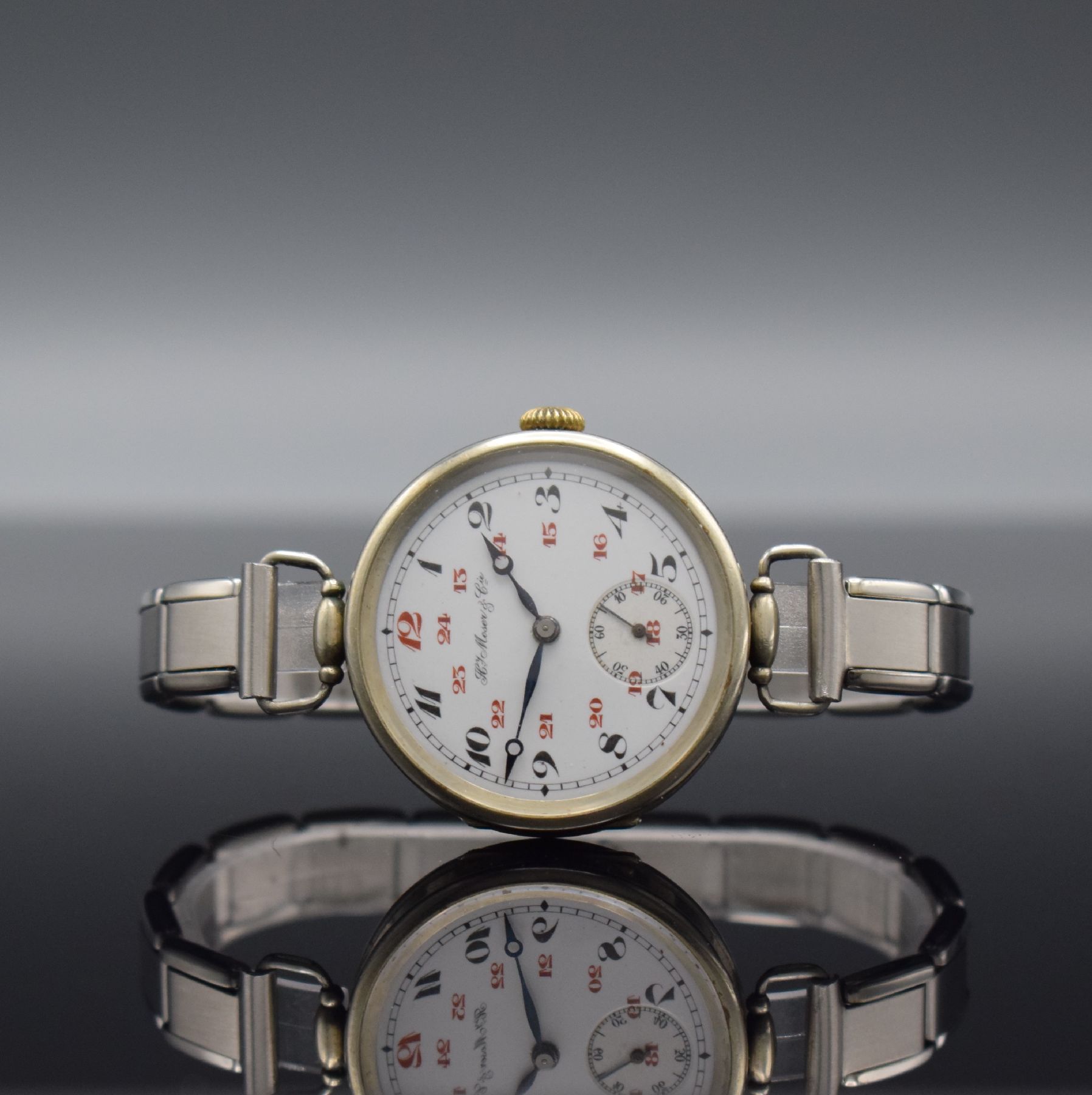 HENRY MOSER & Cie frühe Herrenarmbanduhr, Schweiz f. d. russischen Markt um 1920, Zifferbl., Cuvette & Werk sign., 4-teil. Nickelgeh., Glasrand & ...