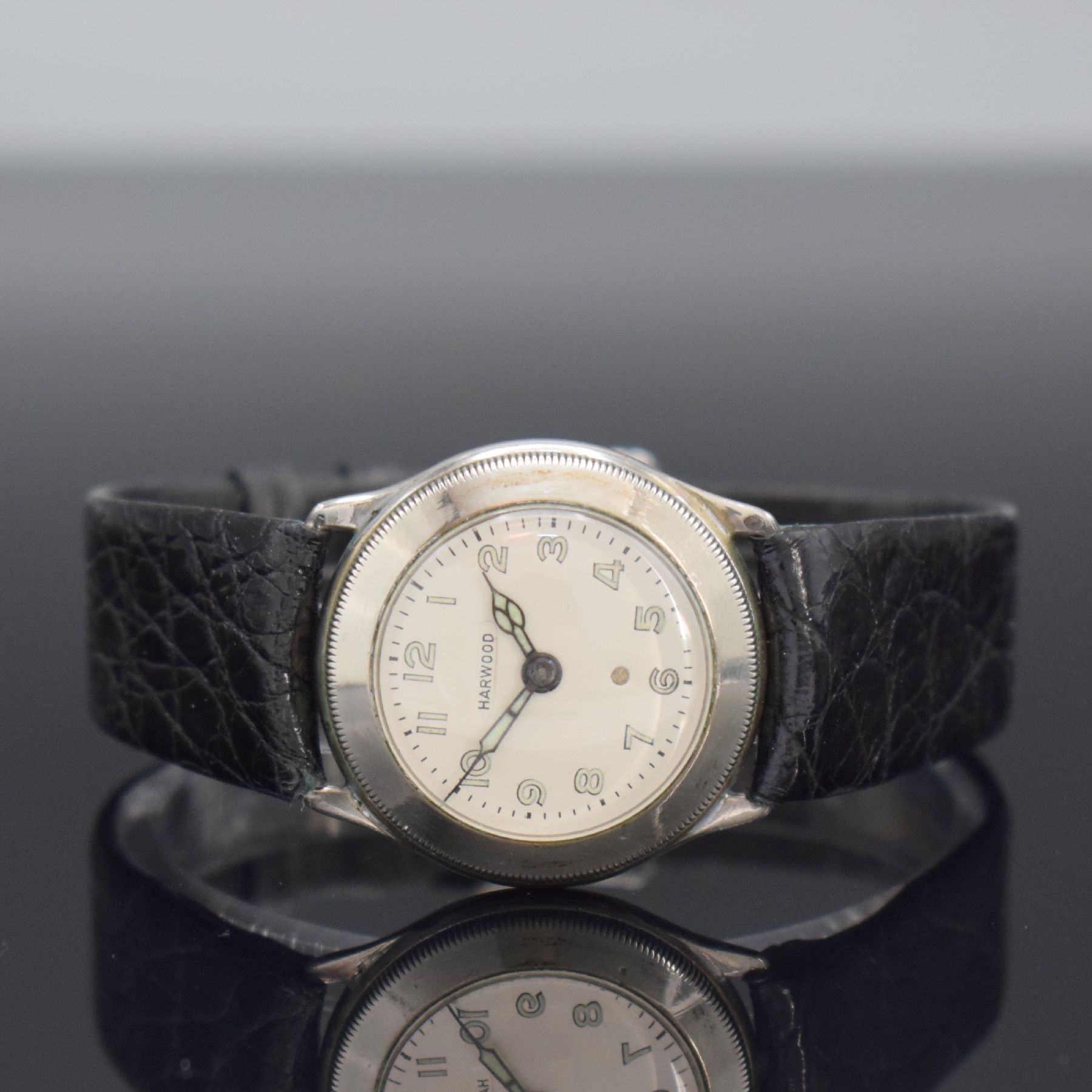 HARWOOD frühe automatische Armbanduhr, Schweiz um 1930, Hammerautomatik, Silbergeh., Boden & Glasrand aufgedr., Zeigerst. über Drehlünette, silb. ...