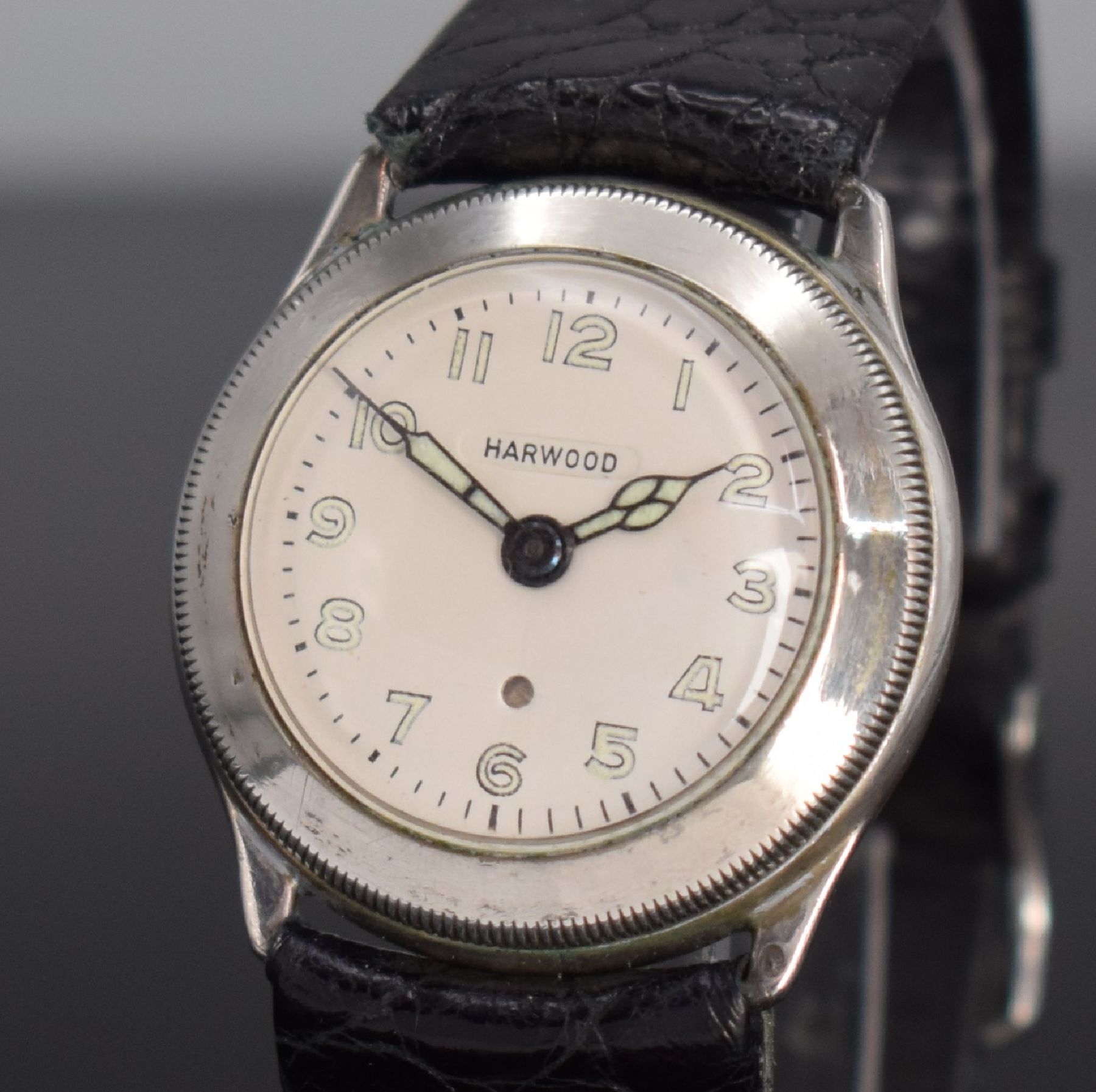 Detail g: HARWOOD frühe automatische Armbanduhr, Schweiz um 1930, Hammerautomatik, Silbergeh., Boden & Glasrand aufgedr., Zeigerst. über Drehlünette, silb. ...