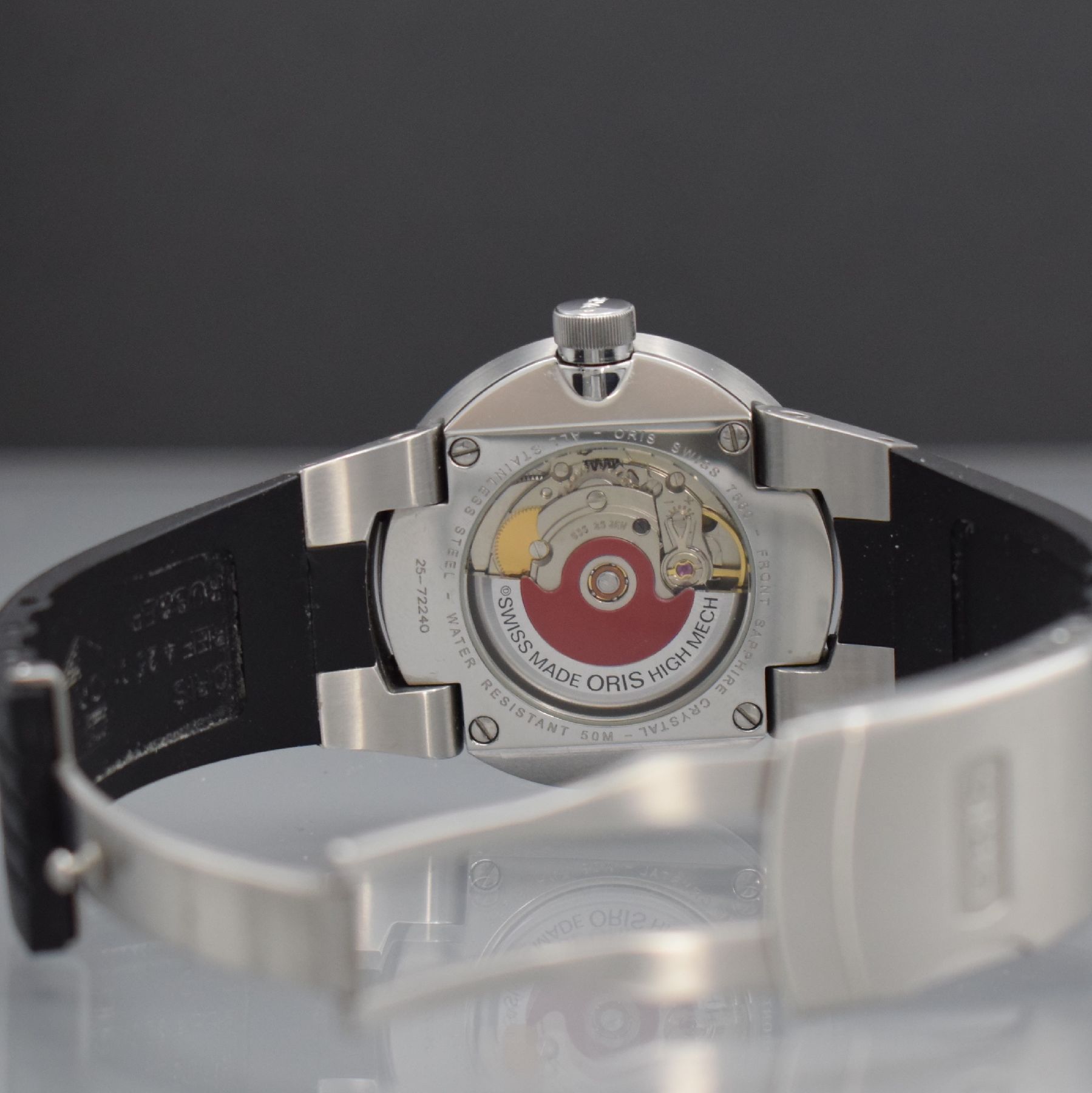 Detail e: ORIS Herrenarmbanduhr aus der Serie WILLIAMS F1 Team, Schweiz um 2007, Automatik, Ref. 7560, beids. vergl. Edelstahlgeh., Boden verschr., Boden ...