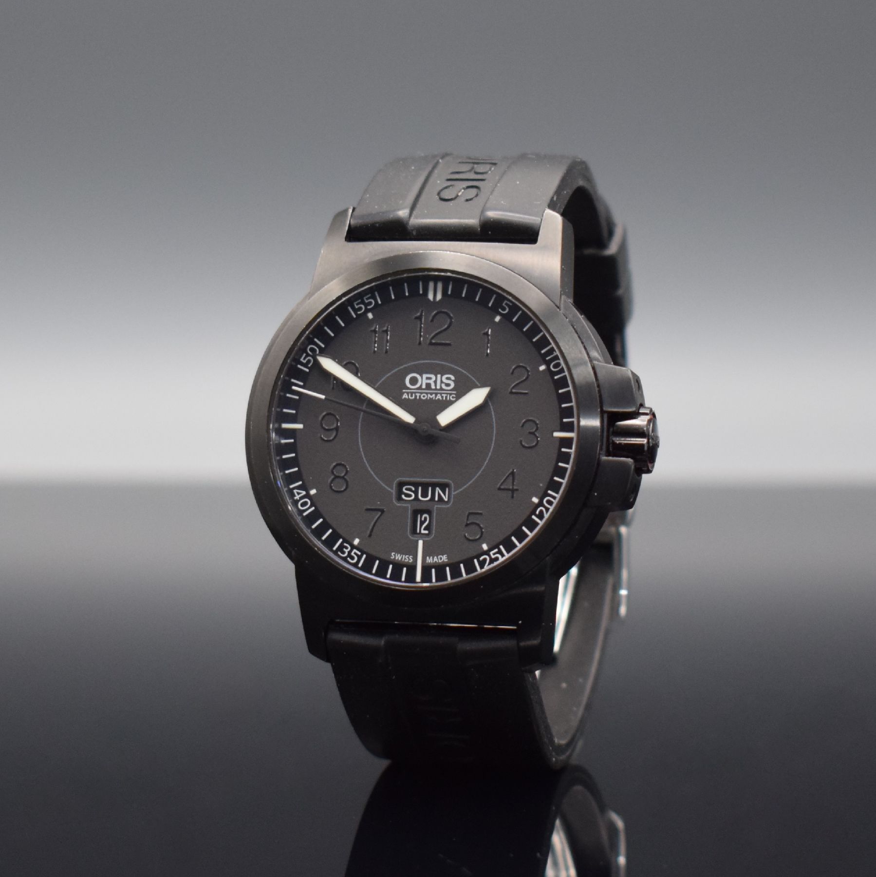 Detail b: ORIS Herrenarmbanduhr Ref. 7641-47, Schweiz um 2005, Automatik, geschwärztes Edelstahlgeh. beids. vergl., Boden & Krone verschr., Kautschukband m. ...