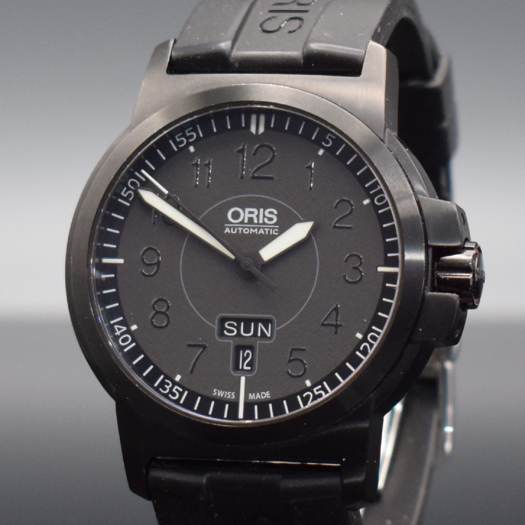 Detail c: ORIS Herrenarmbanduhr Ref. 7641-47, Schweiz um 2005, Automatik, geschwärztes Edelstahlgeh. beids. vergl., Boden & Krone verschr., Kautschukband m. ...