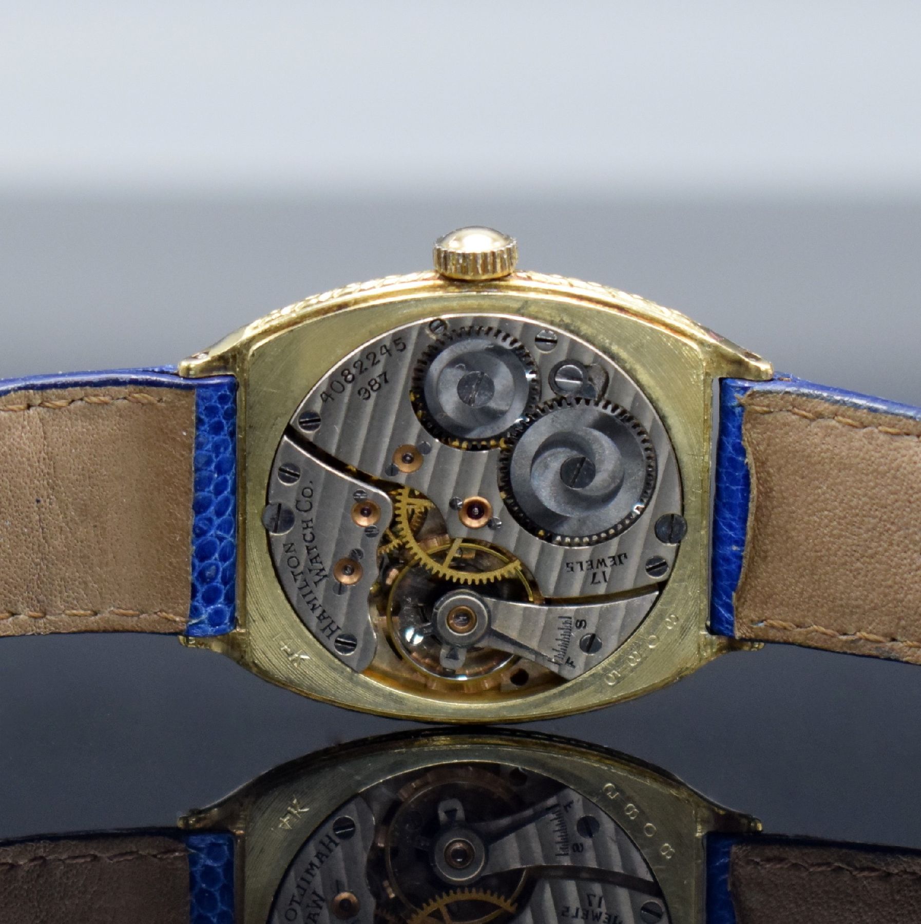 Detail e: HAMILTON Watch Co. Armbanduhr in GG 585/000, USA um 1929, Handaufzug, 3-teil. Gehäuse, Boden & Glasrand aufgedr., silb. Zifferbl. m. arab. Zahlen, ...