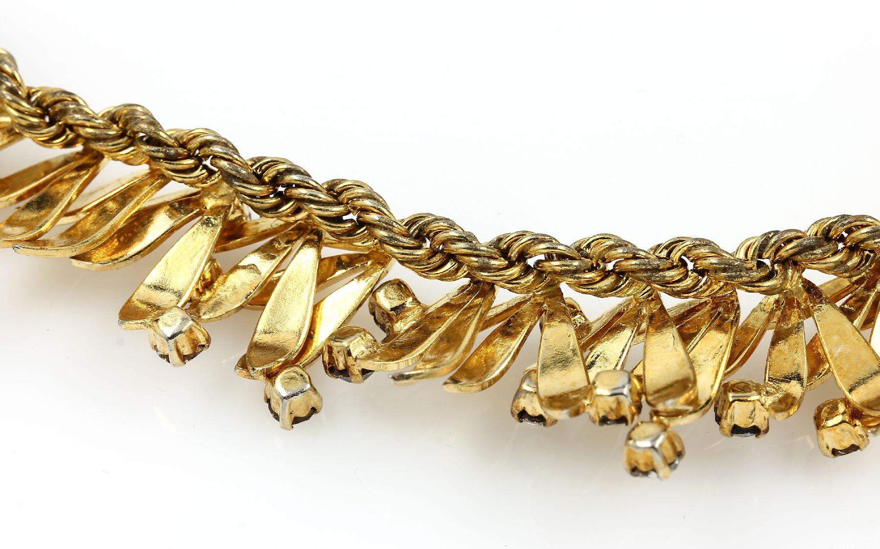 Detail c: CHRISTIAN DIOR Collier, deutsch 1966, Metall verg., Blätterdekor im Verlauf, grav., aufgelegter farbl. Strassbesatz, sign., L. ca.40 cm, ...