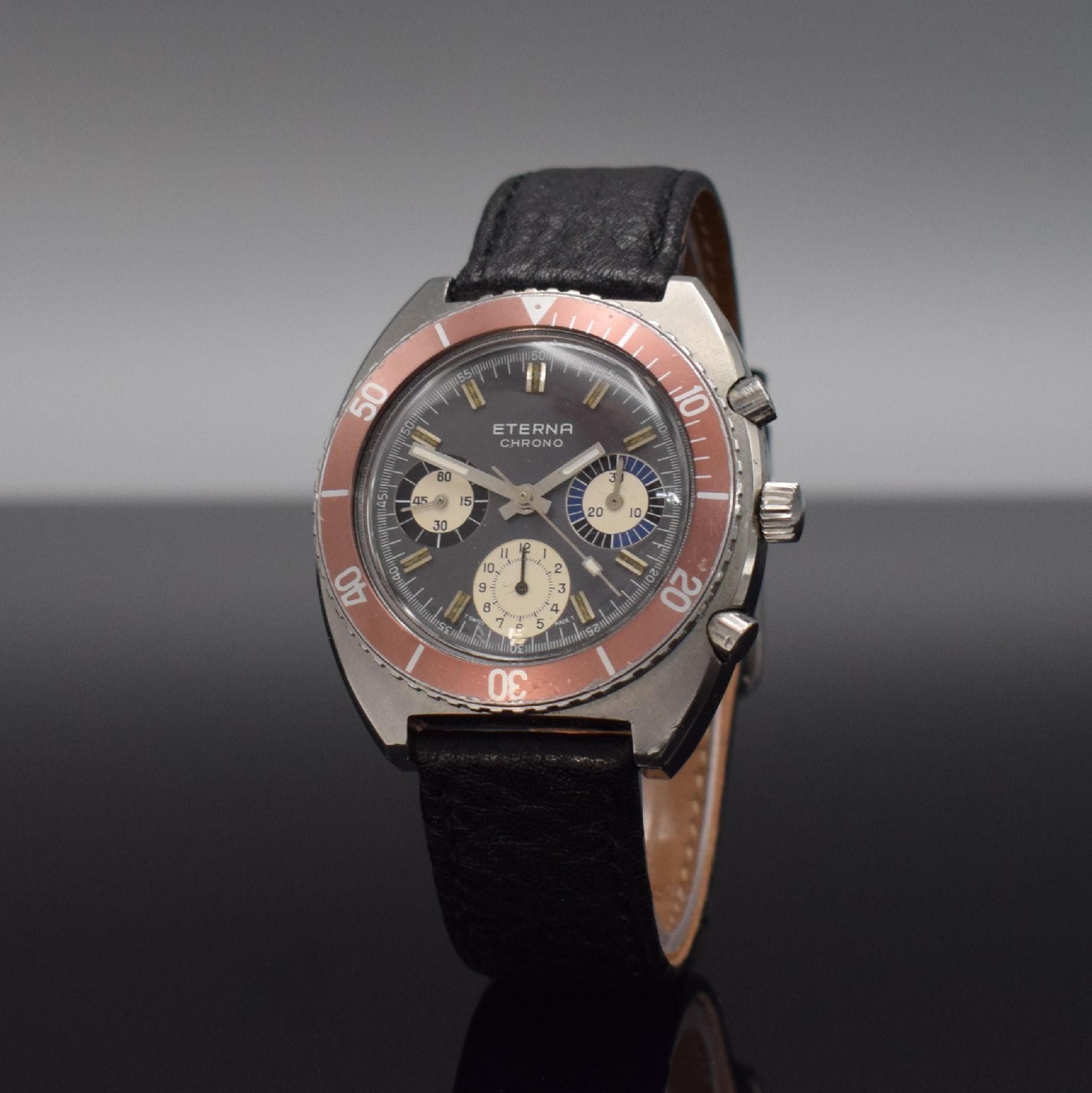 Detail b: ETERNA Schaltradchronograph Kaliber Valjoux 726, Handaufzug, Schweiz um 1970, Ref. 154 FTP - 3, Edelstahlgeh., Boden verschr., kupferfarb. Lünette ...