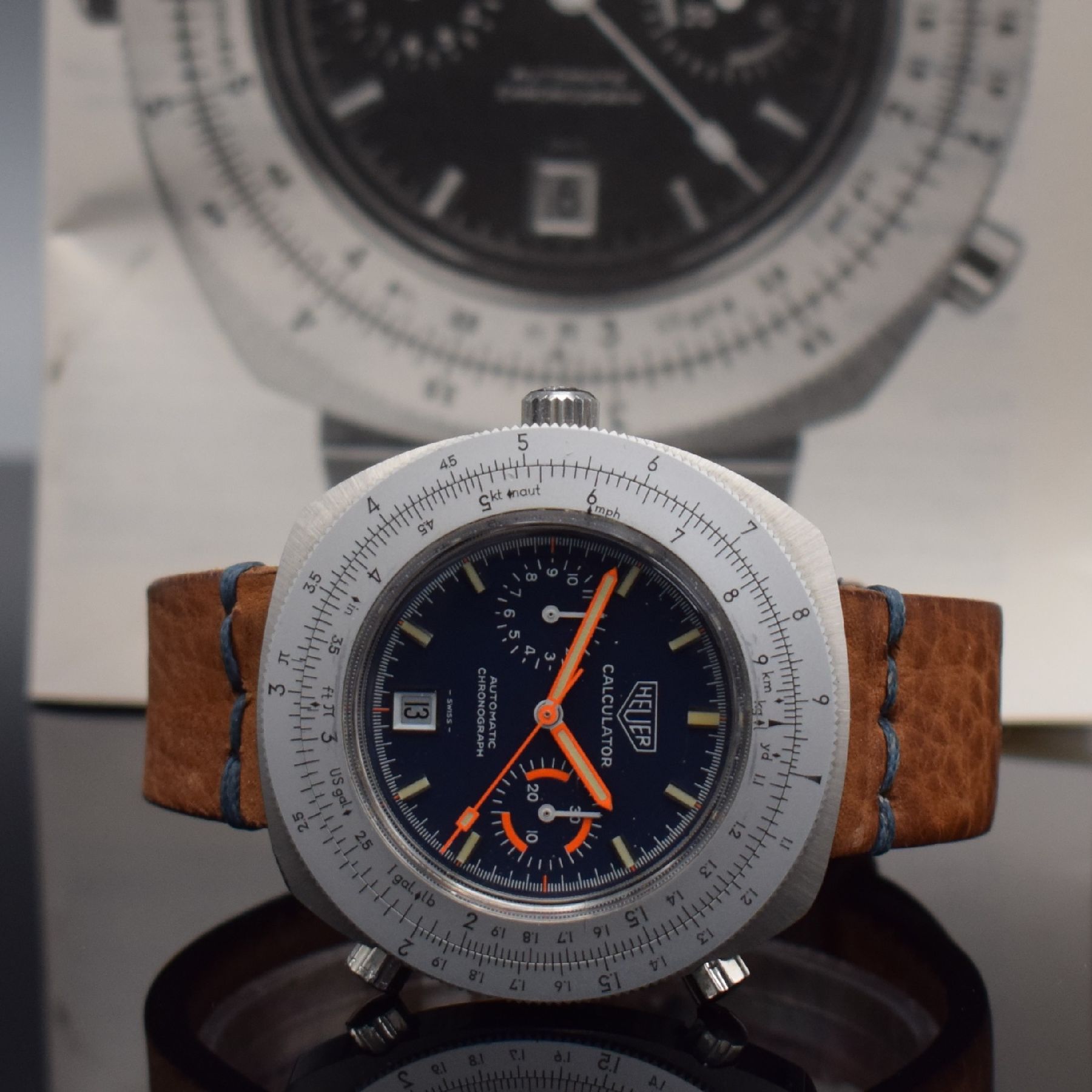 Detail i: HEUER Calculator Armbandchronograph Referenz 10.633, Automatik, Schweiz um 1975, massives, unpoliertes Edelstahlgeh., orig. Drücker & Krone, Boden ...