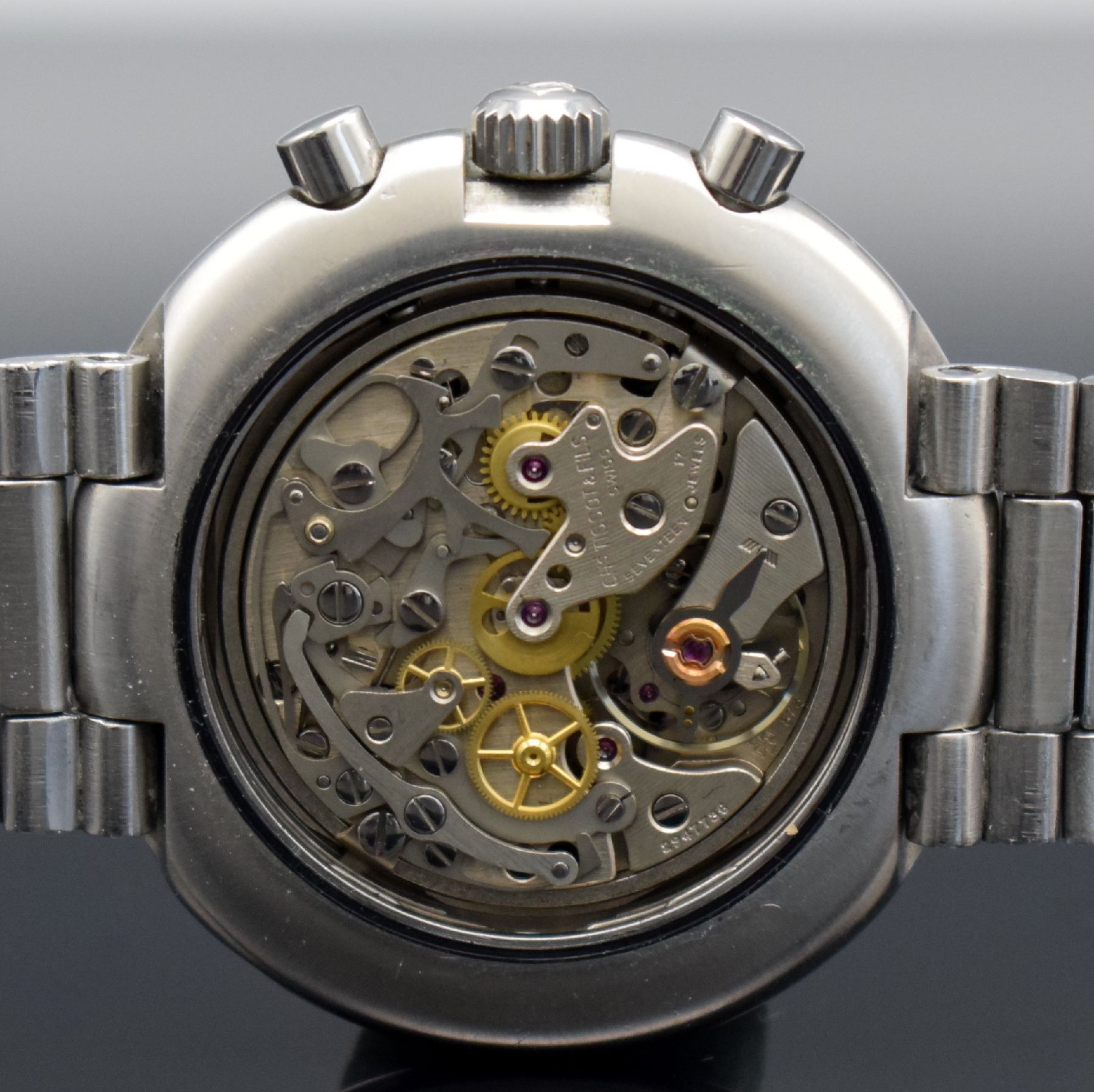 Detail f: TISSOT T12 Armbandchronograph "UFO" Kaliber Lemania 873 Referenz 40505, Handaufzug, Schweiz um 1970, Boden aufgedr., orig. Gay Freres ...