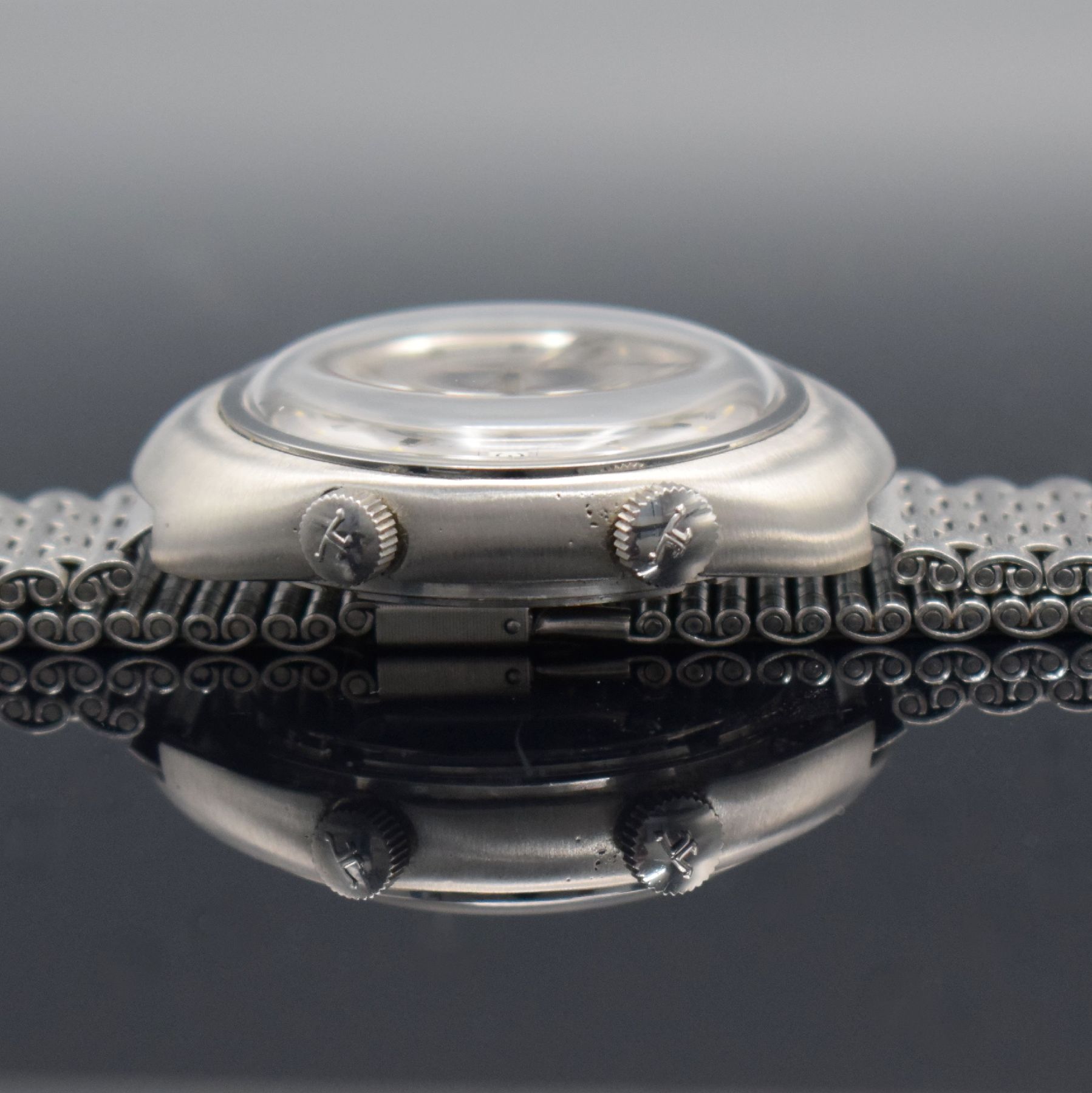 Detail f: Jaeger-LeCoultre Memovox GT Armbandwecker in Stahl, Hammerautomatik, Schweiz um 1970, Ref. E861, ovales, sat. Geh. m. verschr. Boden, NSA Stahlband, ...