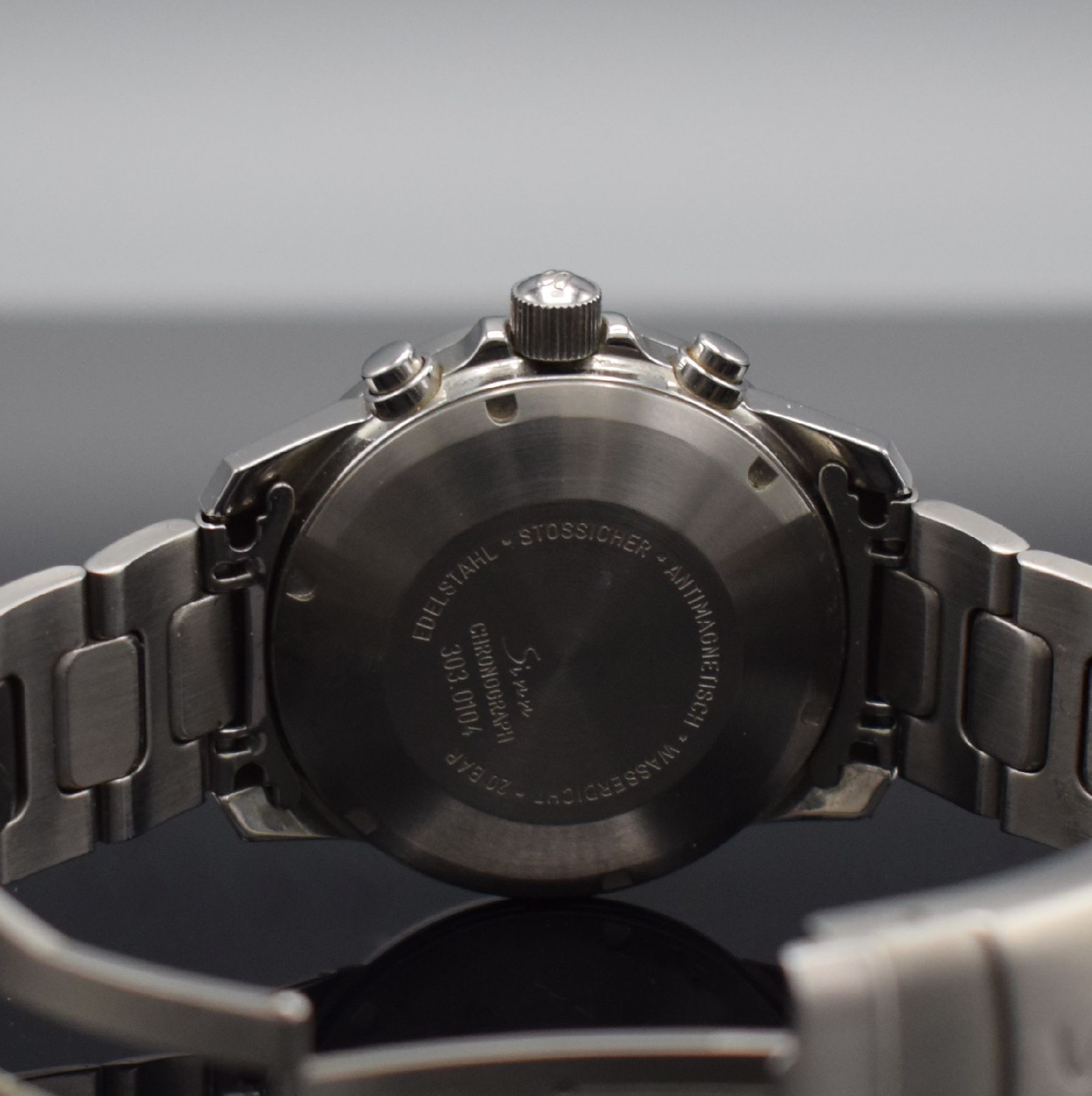 Detail f: SINN Herrenarmbanduhr mit Chronograph, Deutschland um 1995, Automatik, Ref. 303, verschr. Edelstahlgeh. inkl. orig. Gliederband m. Faltschl., ...
