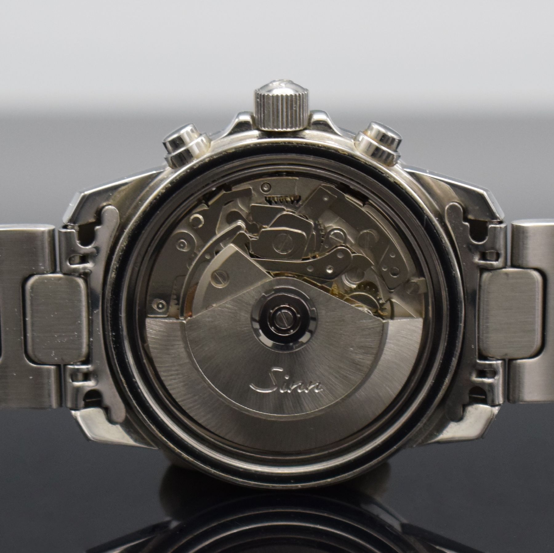 Detail g: SINN Herrenarmbanduhr mit Chronograph, Deutschland um 1995, Automatik, Ref. 303, verschr. Edelstahlgeh. inkl. orig. Gliederband m. Faltschl., ...