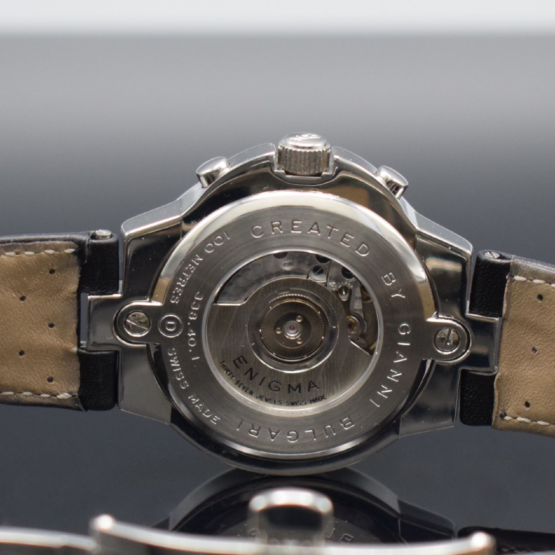 Detail e: ENIGMA by Gianni Bulgrai Armbanduhr mit Chronograph, Schweiz um 2000, Automatik, beids. vergl. & verschr. Geh. in Edelstahl, orig. Lederband m. orig. ...