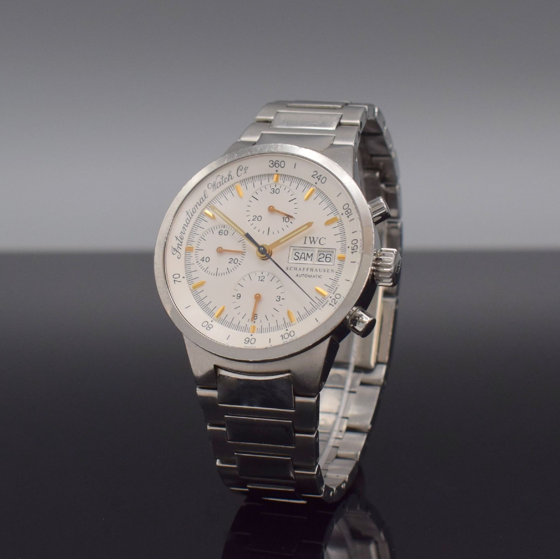 Detail b: IWC GST Herrenarmbanduhr mit Chronograph Referenz 3707, Schweiz um 1999, Automatik, verschr. Edelstahlgeh., orig. Gliederband m. Faltschl., silb. ...