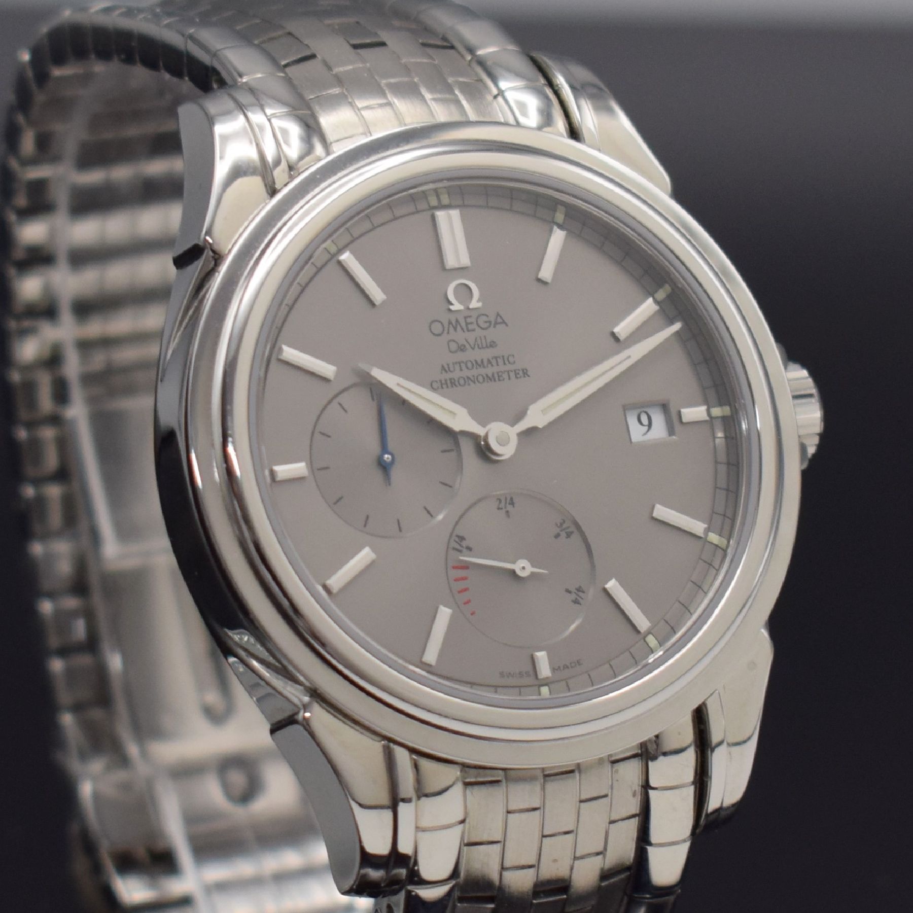 Detail e: OMEGA Herrenarmbanduhr De Ville Co-Axial Power Reserve, Automatik, Schweiz um 2002, Ref. 168.1704, Chronometer in Edelstahl inkl. orig. Gliederband ...