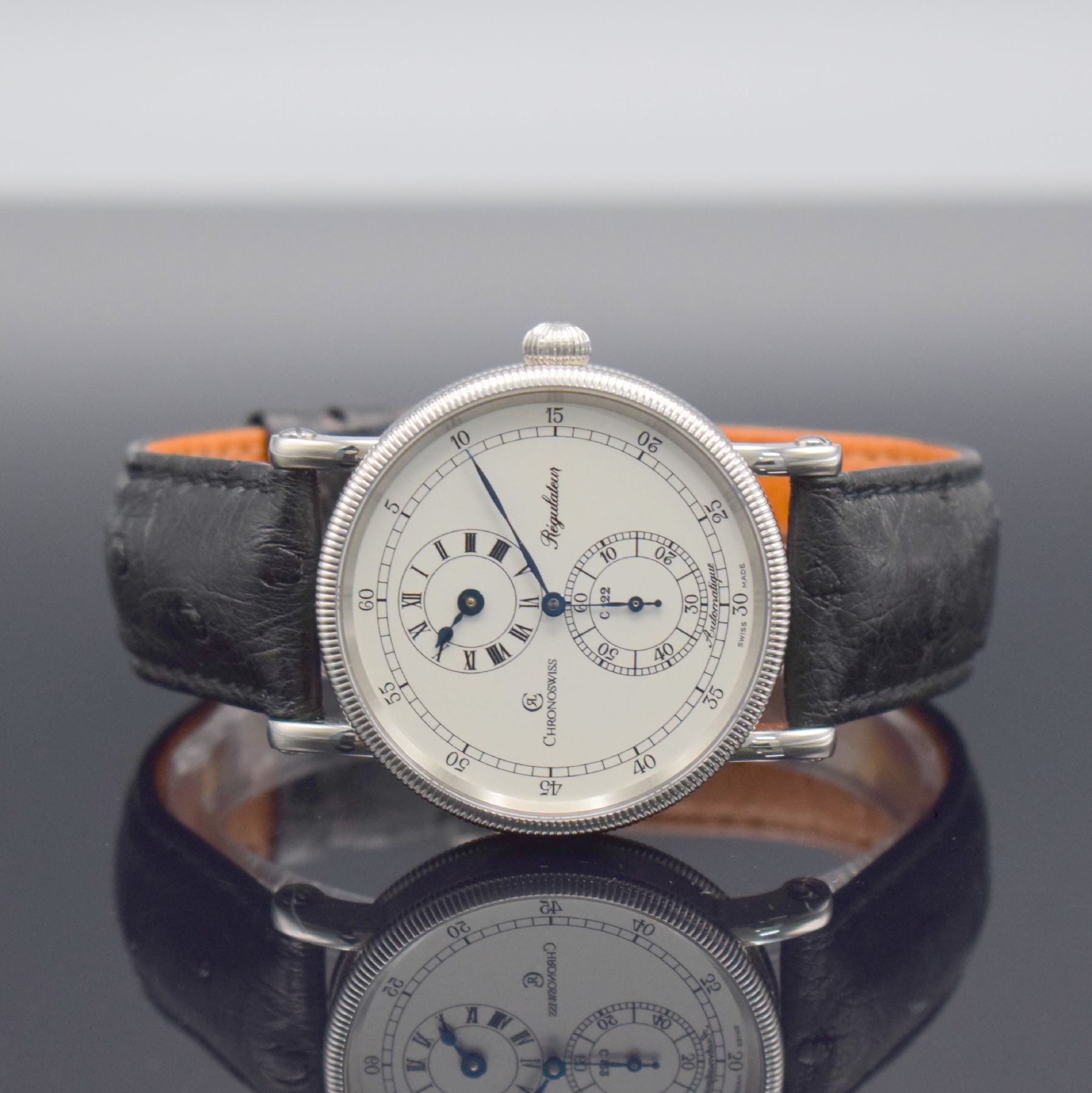 CHRONOSWISS Regulateur Herrenarmbanduhr in Edelstahl Referenz CH 1223, Automatik, beids. vergl. Geh., Boden verschr., orig. Lederband m. orig. ...