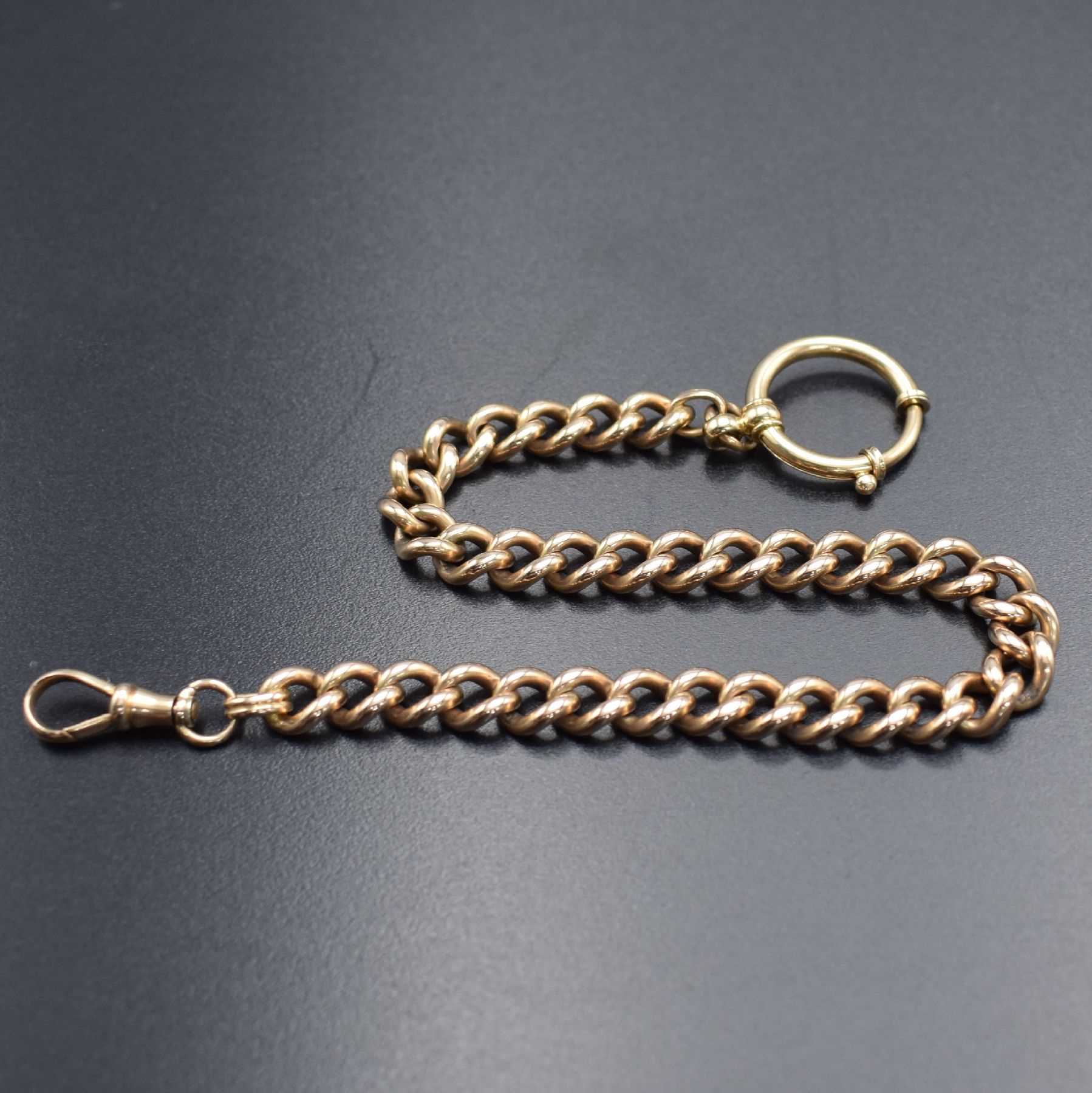 Detail c: Taschenuhrkette in RG 585/000, Deutschland um 1900, mit Federring & Karabiner, massive Ausführung, L. ca. 26,5 cm, Gew. ca. 42g, Nutzsp., verwendb.